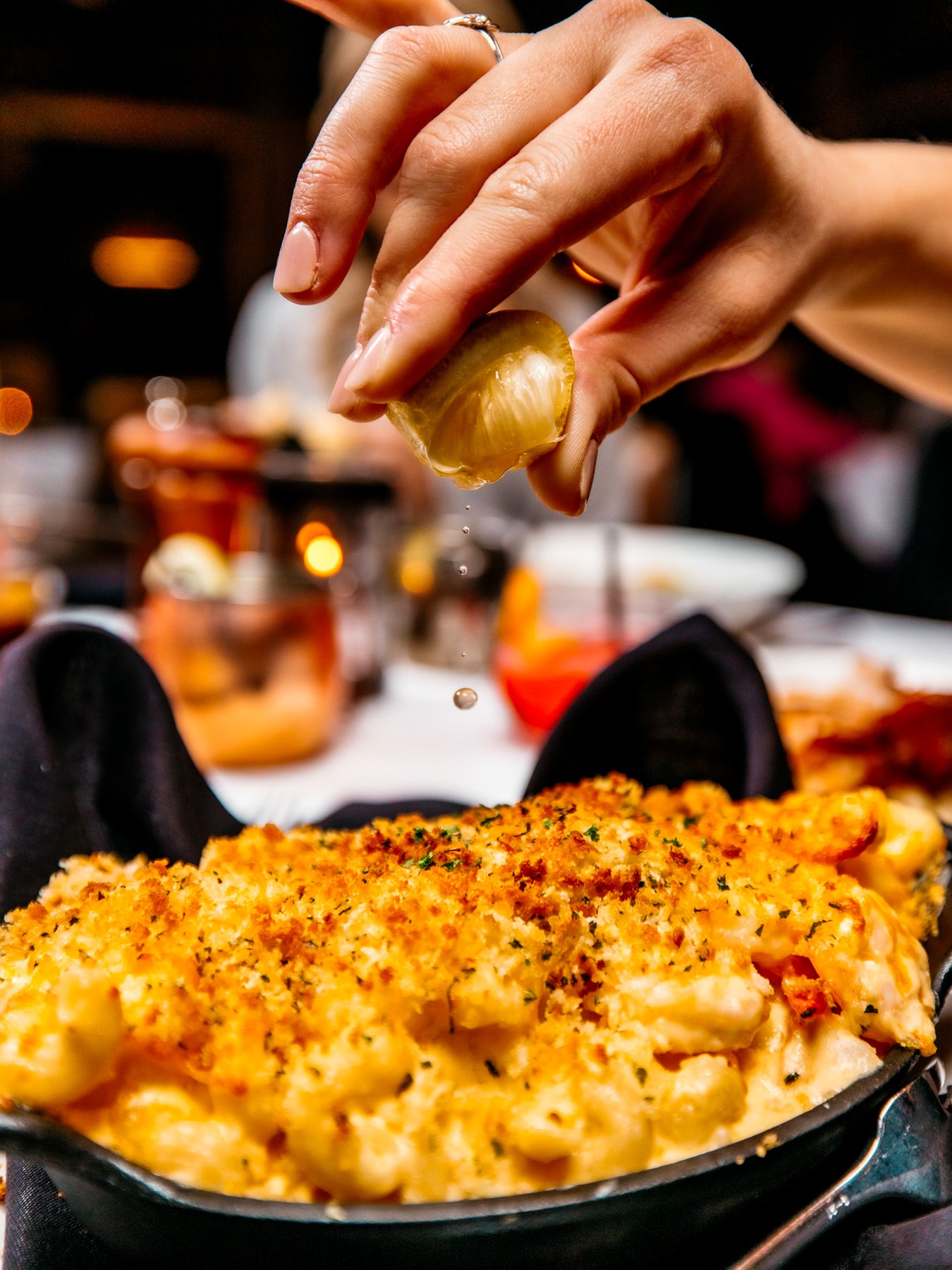 Our seafood mac & cheese makes dinner worth slowing down for.