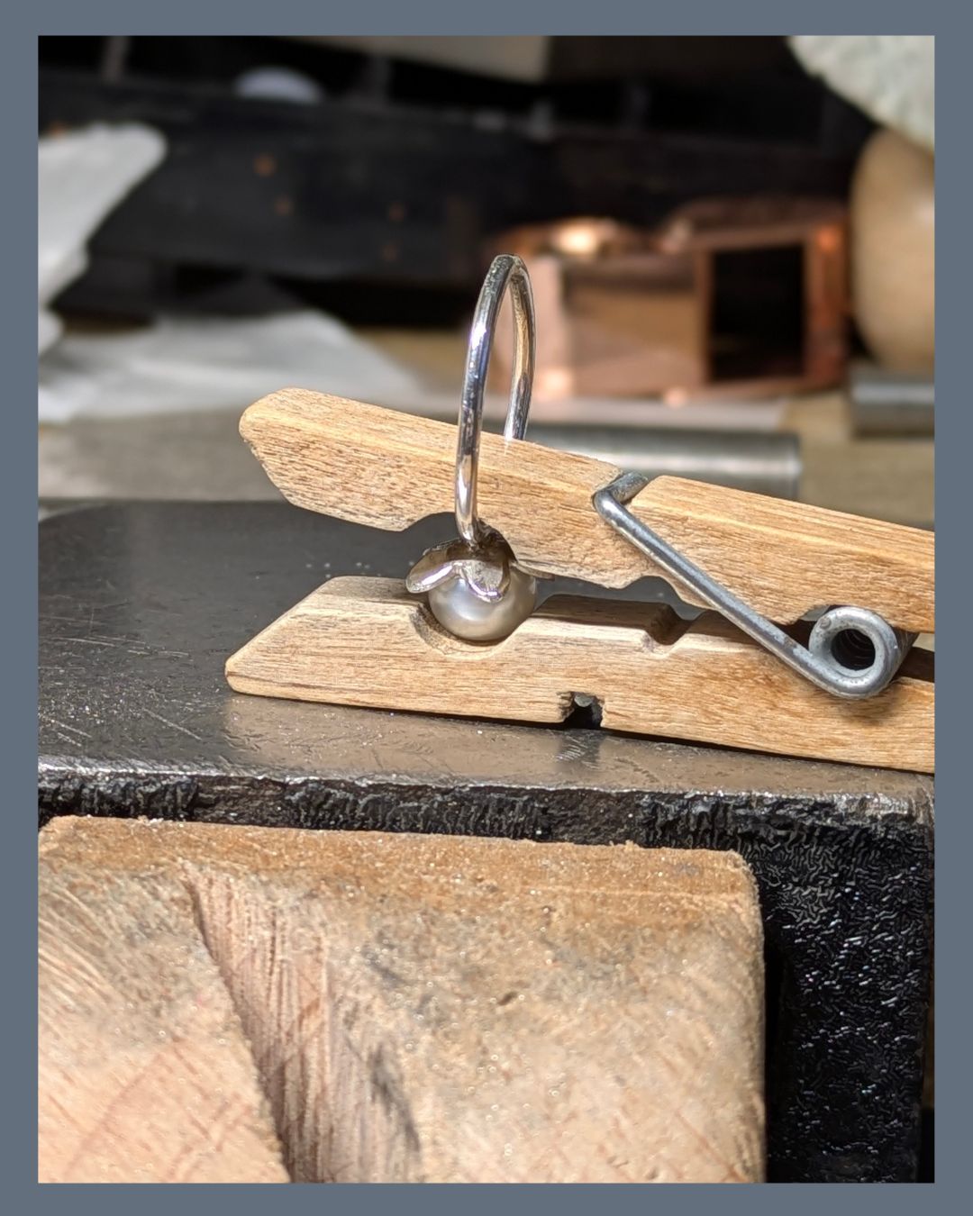 Glue isn't something that I use in making jewellery unless it's setting a pearl. This ring has a small silver post soldered in place, and just a tiny amount of adhesive is added to the post to secure the pearl onto it.
I use a clothes peg to securely hold the pearl in place while the glue dries. It may not be what the clothes peg was designed for but it works really well.