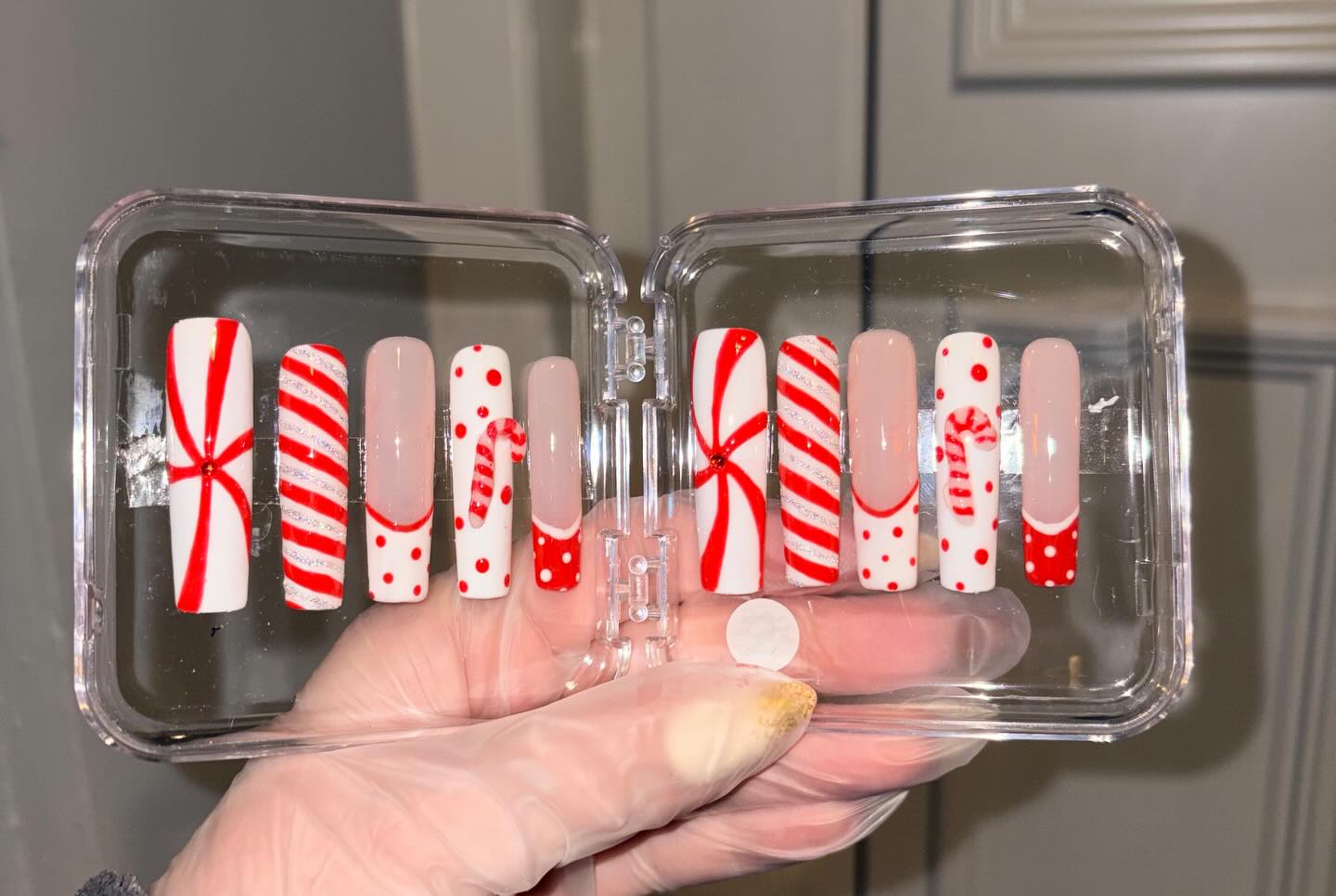 Here’s a sneak peek at our new Hand painted red and white candy cane Christmas press on nails with 3D candy canes! Will be available on our website soon #nailart #christmasnails #handpaintednails #nailsnailsnails #ChristmasGiftIdeas #CreativeNails #pressonnails #gelxnails