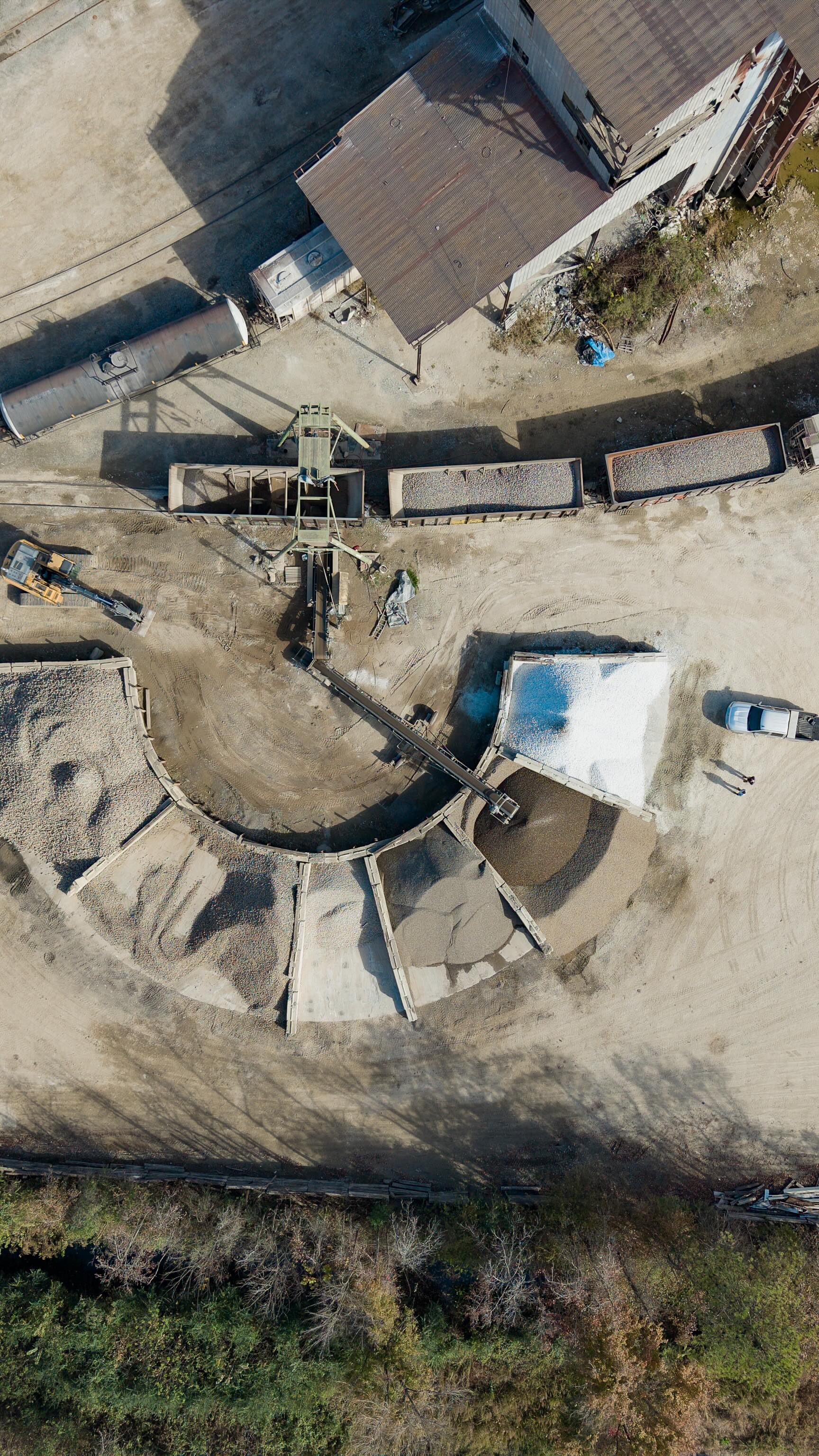 You truly don’t understand the size of this place until you see it from above…. In this video we are unloading a railcar of 1–2” New England River Rock at our Selma, North Carolina facility. A big thank you to our partner Bailey Feed Mill for their consistency and teamwork!
#DeFeoMaterials #RailYard #RailcarUnloading #SelmaNC #StoneSupply #BulkMaterials #LandscapeSupply #ConstructionSupply #MaterialHandling