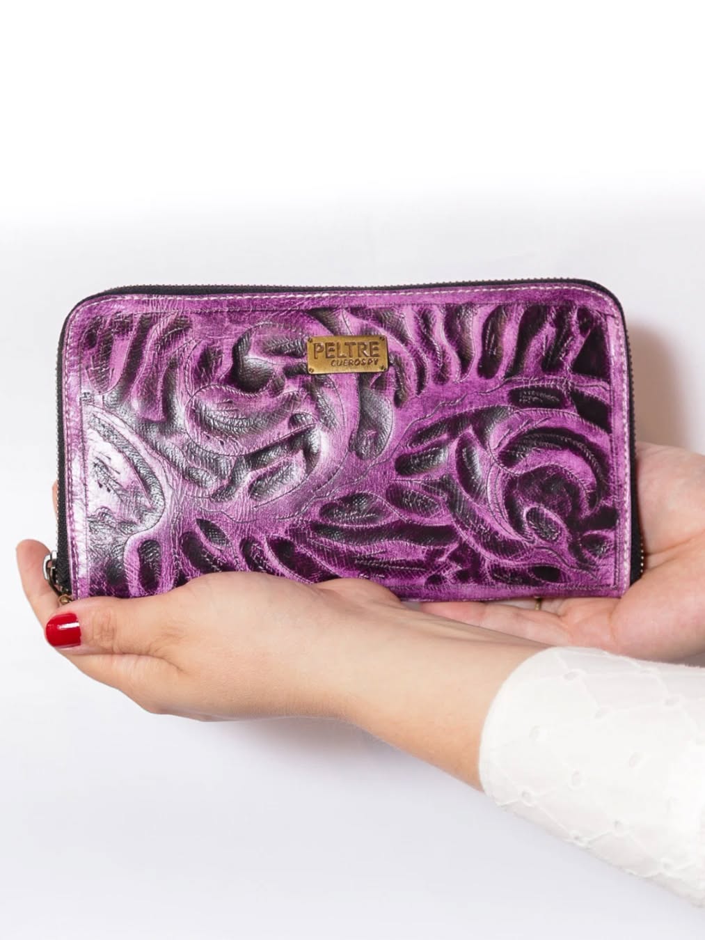 Billetera para todo el día.
Arte paraguayo.