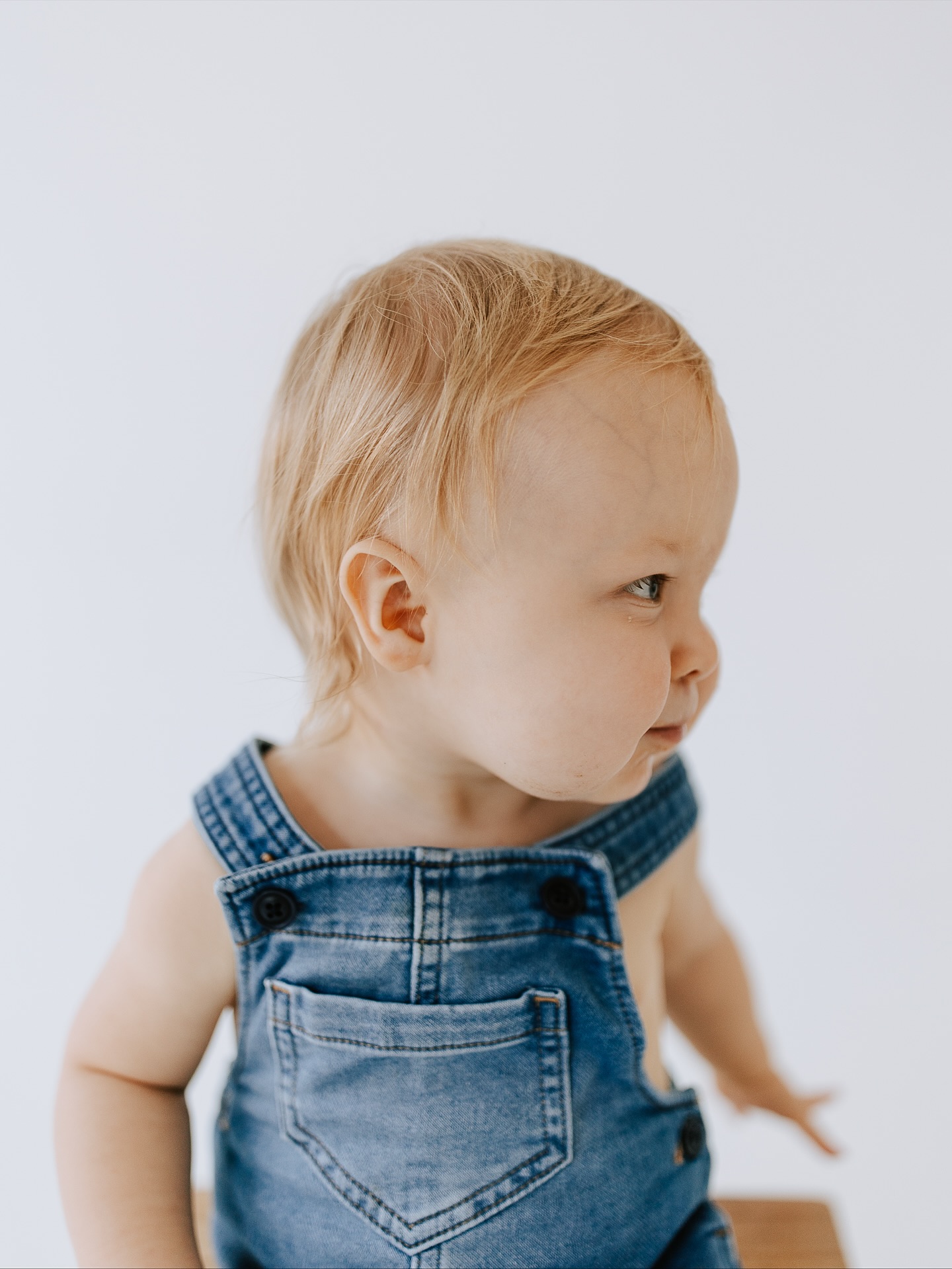 After 7 months with a helmet, this little guy of mine is officially helmet free as of tomorrow. While it was worth it, I am so excited to get to look at his sweet head without it. I captured someone year photos of him last week to document this sweet age. You can find me snuggling his sweet head this weekend.
