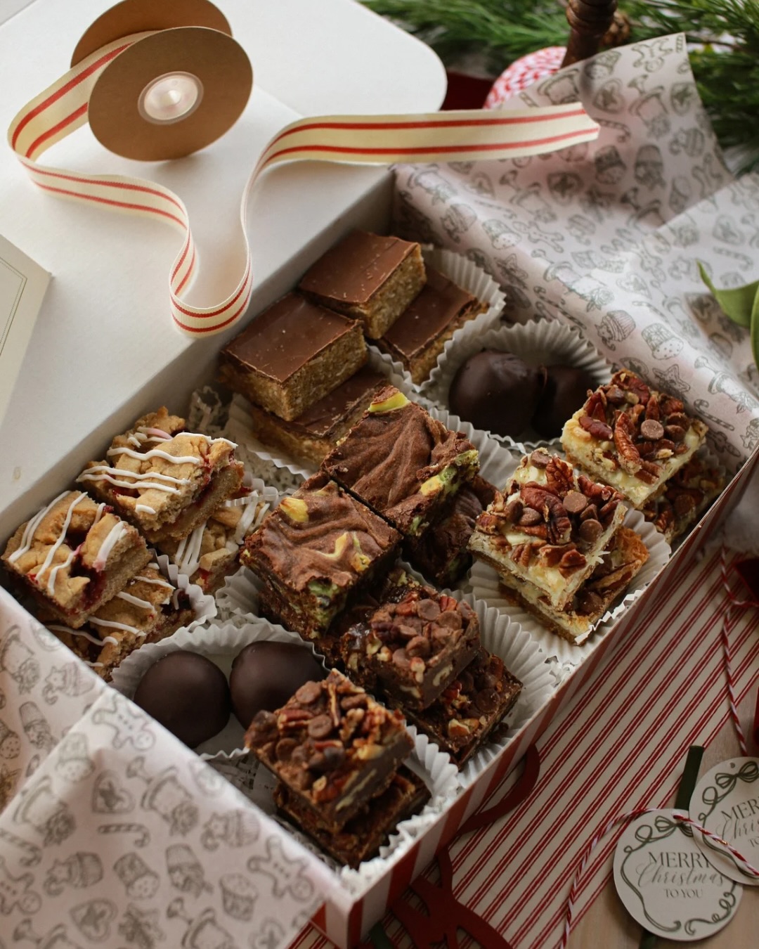 If you’ve been craving a Christmas that feels warm and unhurried…
where sweets are shared slowly, where every bite tastes like a memory, and where gifting feels thoughtful rather than rushed.
These boxes were made with you in mind ♥️
Classic cookies that feel like tradition.
Decadent squares that taste like heirloom recipes.
Nostalgic confections that bring back the wonder of childhood.
Not just treats, but tiny pieces of Christmas magic, gathered together so you can create moments that feel intentional, beautiful, and meaningful! 🎁
