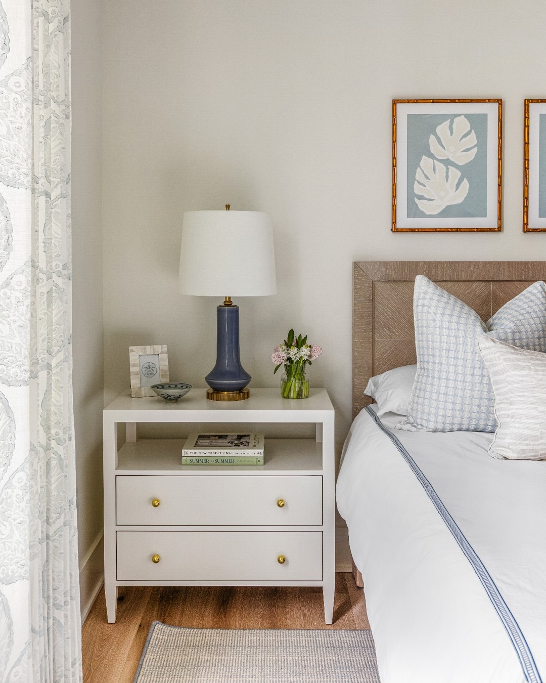 a serene primary suite layered in soft neutrals and shades of blue 🤍
