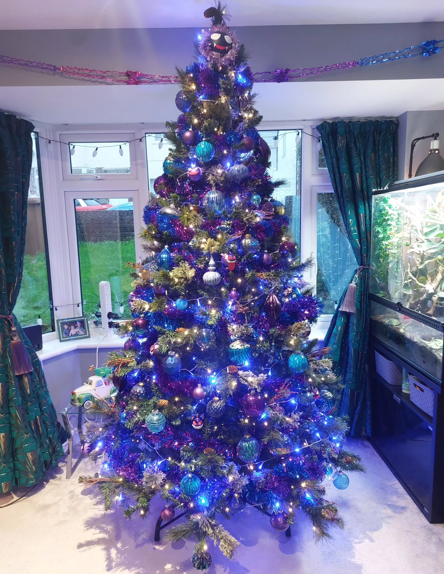 Tree up. This year a blue and purple theme with a few Pokemon sprinkled in. We even have Gastly topping the tree.
#pokemoncommunity #gastly #gengar #Christmas #christmastree