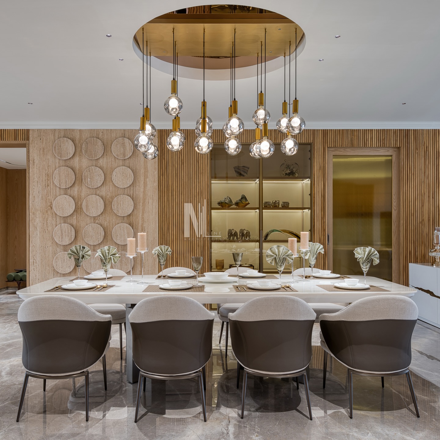 A dining space anchored by a statement wall, travertine marble cladding, circular back-lit discs, warm fluted wood, and a seamless crockery display tying it all together. ✨
Soft neutrals, sculptural lighting, and refined textures create a calm yet striking focal point for the entire home.