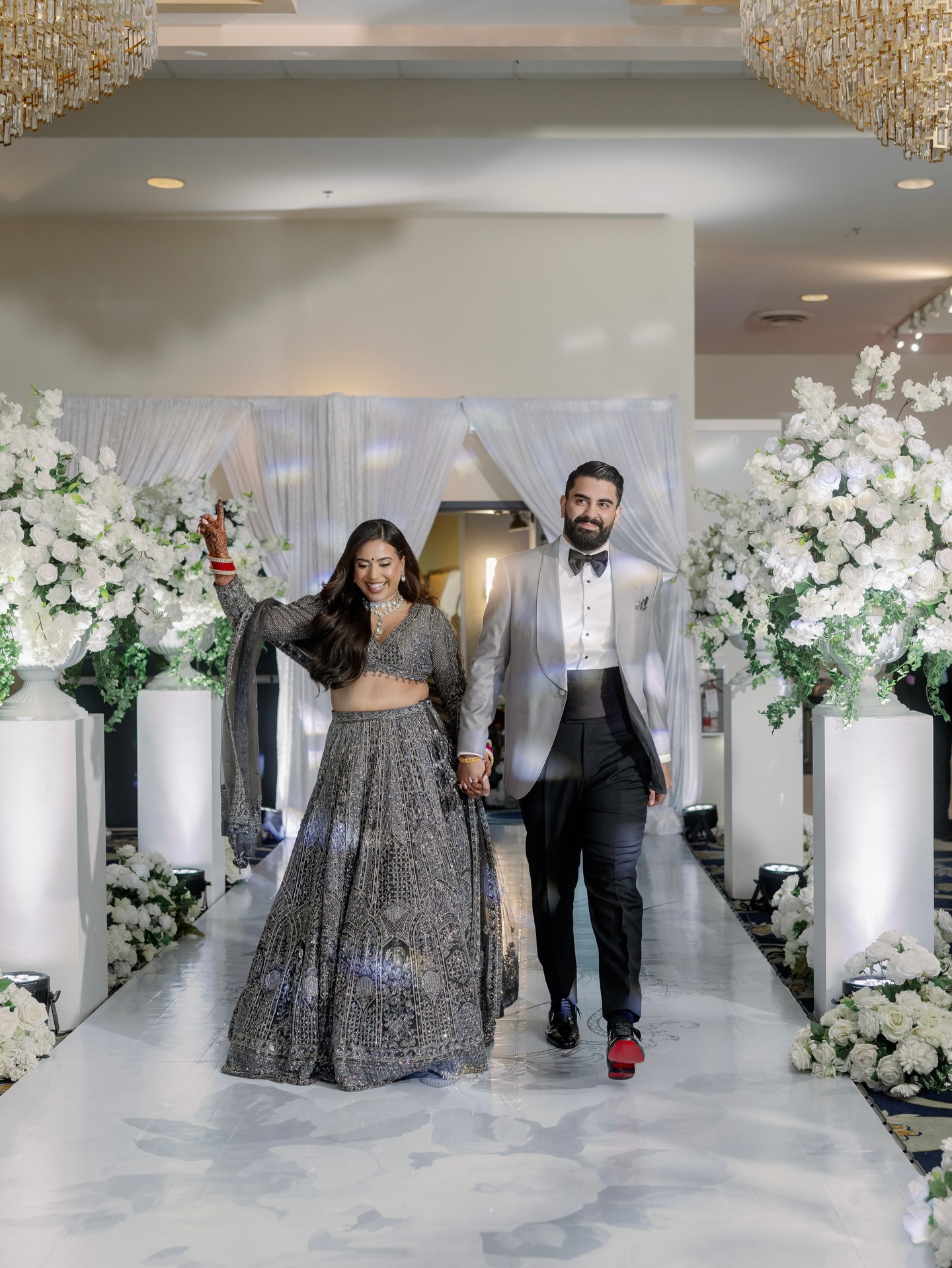 White opulence, crafted for the unforgettable
Design/Decor &Florals @universaldecor
Photo / Film: @jagphotostudios
HMUA: @bybavbrar
Bride Attire: @vivahcollection
Groom Attire: @loropiana @modellobespoke
DJ: @decibelvan @jeditzmusic
Portraits: @theportraitstory_
Floor Wrap: @conceptfloorwrap
Screen Design: @heirloomstationery
Our stunning Couple @nav.tatla @jasmin_grewal