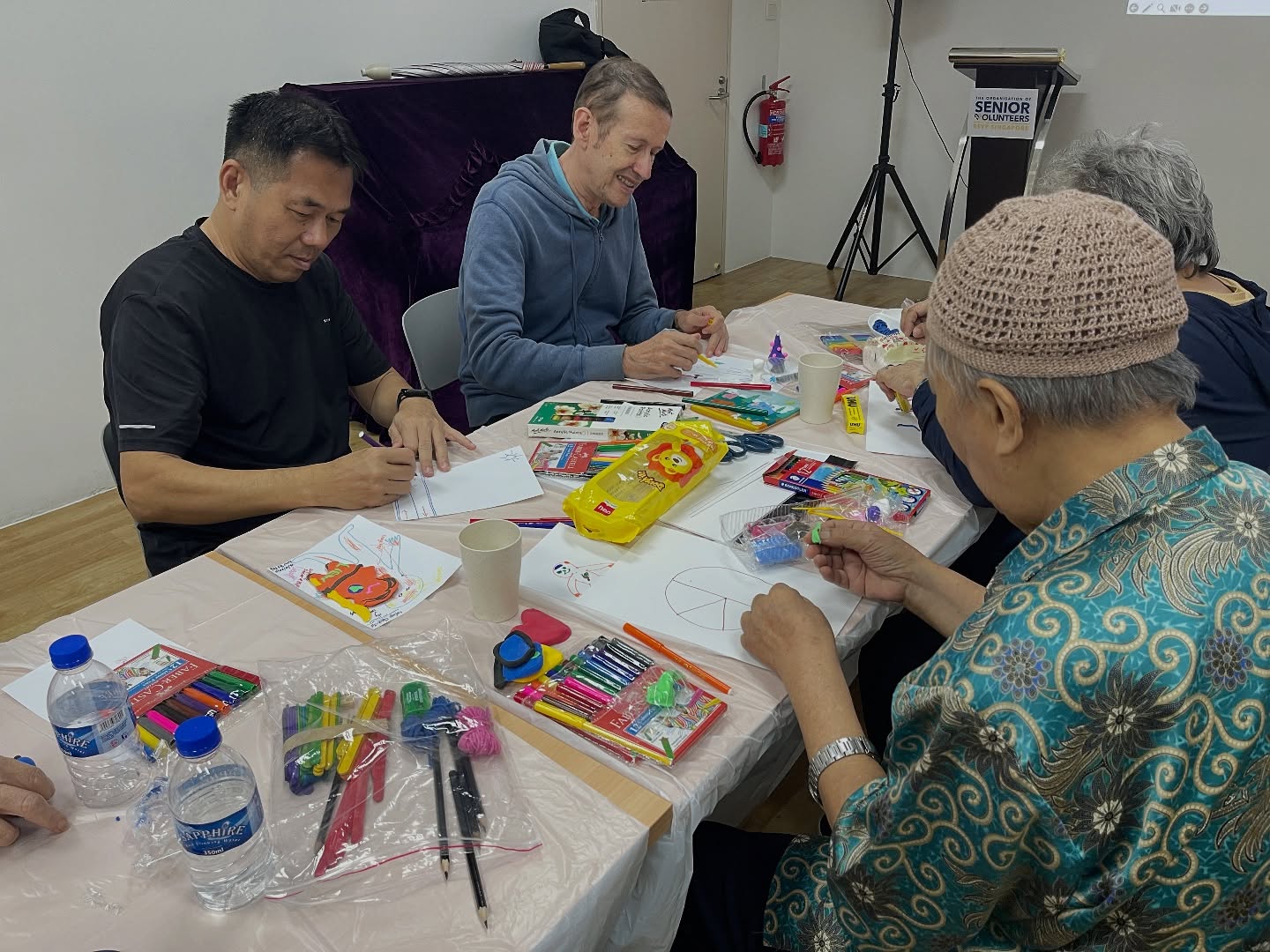 With the school holidays here, it’s also a natural pause for us to plan, reflect, and upskill. This season, we’re grateful for the opportunity to partner with RSVP Singapore, a non-profit organisation that empowers seniors through volunteerism.
Together, we ran a workshop for their volunteer mentors who support underprivileged children. Through hands-on learning, we guided them on how art can be a gentle and powerful tool to build rapport, engage meaningfully, and support children with emotional regulation.
The volunteers came in with such openness, warmth, and a genuine desire to grow. We were amazed by their creativity and the thoughtful ways they explored using art to connect with the children they mentor. Many of them shared their hopes of supporting children with learning needs as well, and it was inspiring to witness how they considered each child’s unique way of engaging and expressing themselves.
Honoured to play a small part in strengthening the circle of care.
#artastherapy #arttherapyheals #arttherapyworkshop #artforwellbeing #arttherapysg #arttherapyworkshops
#professionaldevelopement #lifelonglearning #activeaging #growthmindset #arttherapyforseniors