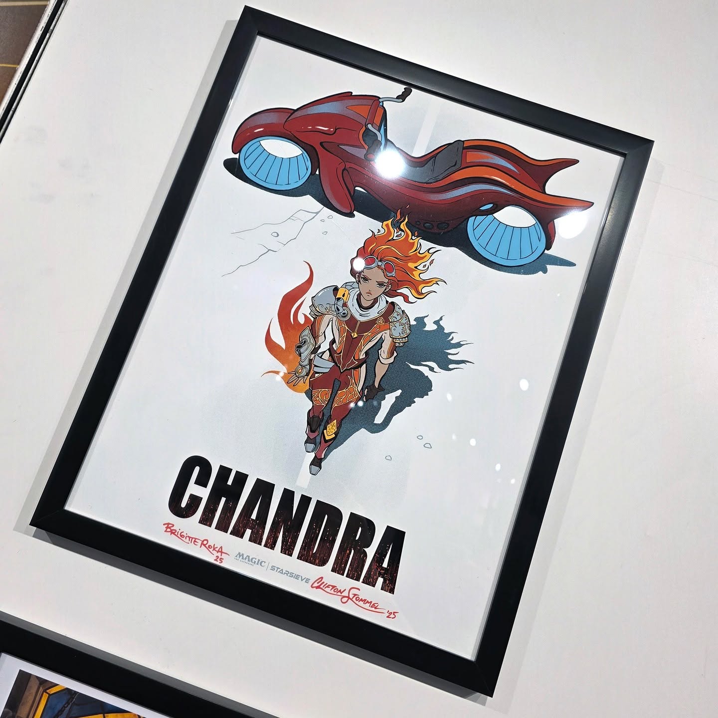 🔥🔥 Major PICKUP ALERT 🔥🔥
Haiku Pop Gaming & Collectibles just snagged a STUNNING Akira-style Chandra art print signed by the ultra-cool artist duo @brigitteroka & @stommelhaus at MAGICON 2025!
This piece is a flaming fusion of Magic: The Gathering and cyberpunk energy — Chandra’s never looked more bada$$.
Huge shoutout to Bridgitte Roka and Clifton Stommel for being the raddest couple at the con and sharing their epic vision with the world.
This beauty’s is on display!
#MTG #ChandraNalaar #AkiraVibes #MAGICON2025 #TCGArt #ArtistAlleyFind #HaikuPopCollects #SignedArt #BridgitteRoka #CliftonStommel #stommelhaus #brigitteroka #magicmeetsanime