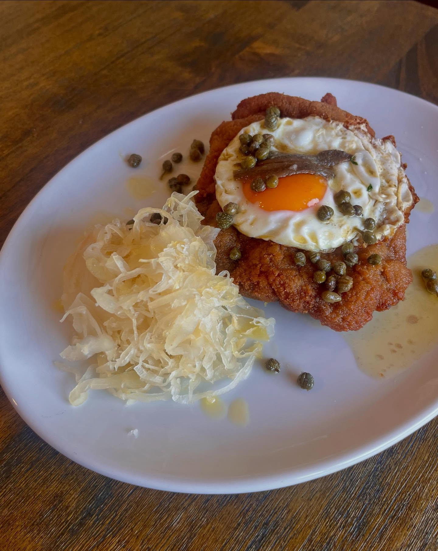 New Special- Veal Holstein
Veal schnitzel topped with a fried egg, anchovies, caper butter and sauerkraut.
Best enjoyed with a cold schooner of Tilba Weatherboard Lager 🍺✨