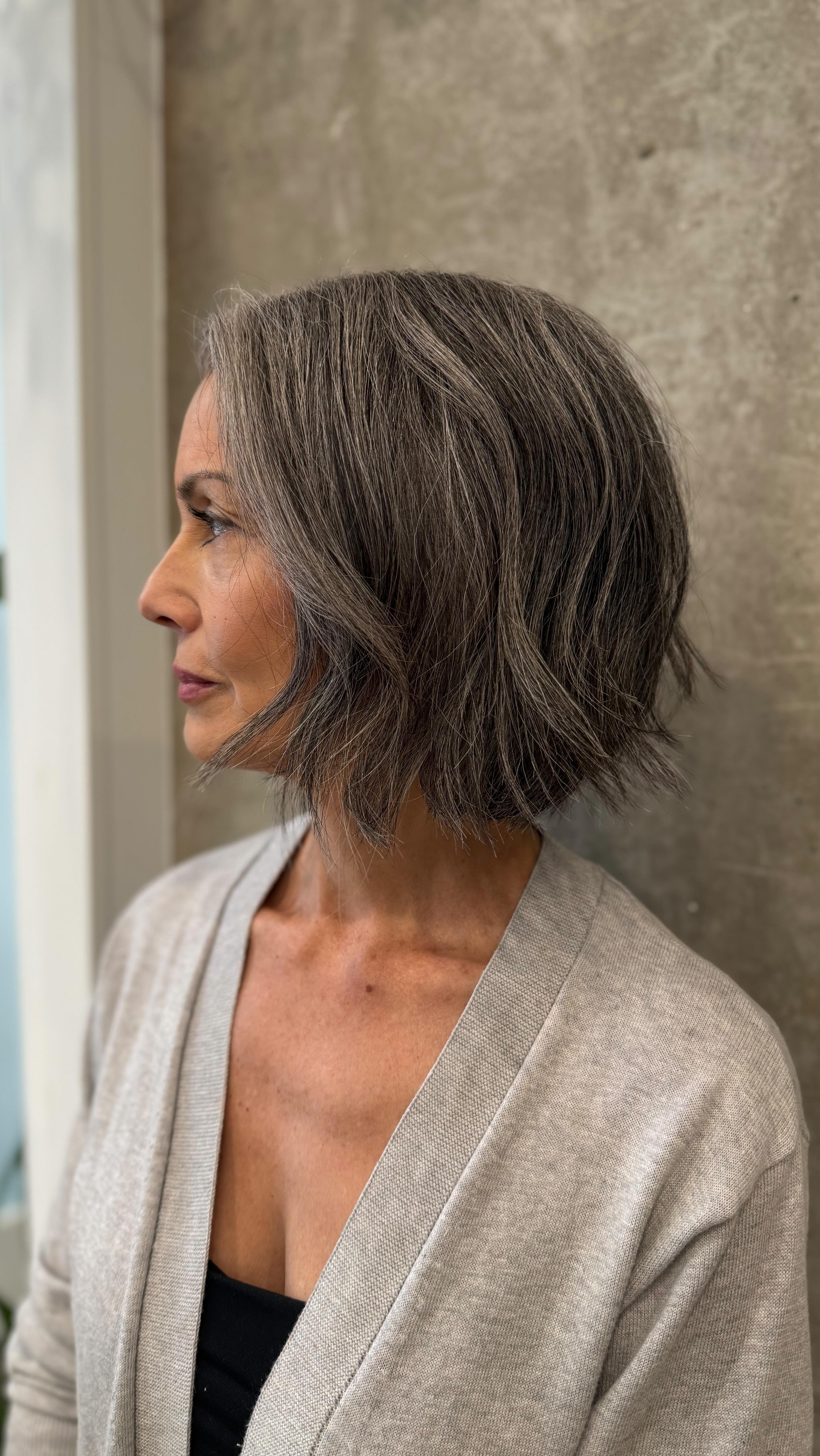 Grey doesn’t have to feel heavy and neither does your haircut.
This guest had 75%+ greys and long hair that lost a bit of spark.
So we kept it simple:
a warm-reflection gloss for shine, and a clean textured bob to lighten everything up.
It’s always the subtle shifts that surprise you the most,
Simple change, Big impact. ✨
If you’re curious what a small refresh could do for you, book a complimentary consultation and let’s explore your options.
✴︎
𝘠𝘰𝘶𝘳 𝘴𝘵𝘺𝘭𝘦, 𝘺𝘰𝘶𝘳 𝘧𝘭𝘰𝘸, 𝘺𝘰𝘶𝘳 𝘦𝘹𝘱𝘳𝘦𝘴𝘴𝘪𝘰𝘯.
✴︎
𝗕𝗢𝗢𝗞 𝗡𝗢𝗪:
🌐Online: www.flowwith.ca
💌More inquiries:
➜ TEXT: 587 894 2025
➜ DM: @flowwith_jenny (Replies might take a little longer!)
@flowwith_jenny
@artistcollectiveyyc
#GreyHairSolution #LetYourGreysGrow #GreyHairJourney #HairColorYYC #HairGlossing #WarmGloss #TexturedBob#DimensionalGrey #HairRefresh #GreyBlendSpecialist
#CalgarySalon #FlowWithJenny