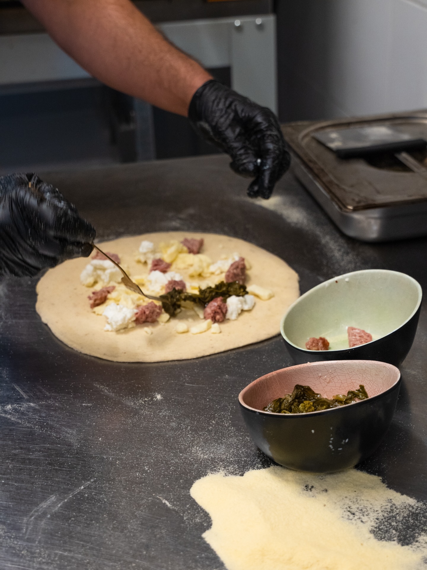 Crafting flavor by hand — fresh dough, rich cheese, savory sausage, and vibrant greens coming together. The art of good food starts with good ingredients. 🍕
#pizza #italianpizza #asentimento
