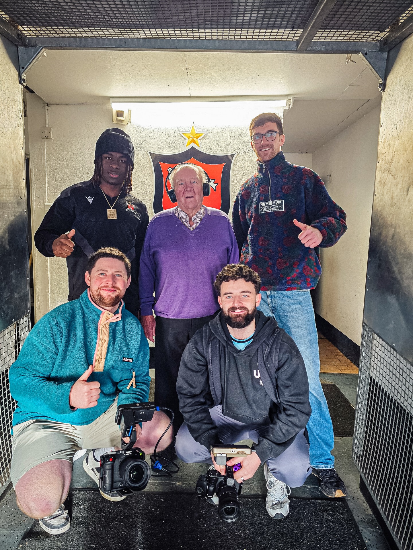 The Team behind THAT Dundalk Kit Launch video. 🎥💥
We had an incredible time shooting with the man of the moment Reggie for the Dundalk FC Kit Launch. Seeing the campaign go officially viral…well isn’t that just the ultimate return of the strategy, planning, and long nights our team poured into creating it.
We are also thrilled to confirm our commitment to the club, remaining the Principal Partner of Dundalk FC for another year. Mon The Town! 🤍🖤
A huge thank you to our brilliant local partners and friends who helped make this video happen: Mullens Dundalk, the incredible team at the @spiritstore.ie , the always-welcoming @county_museum_dundalk , and the enthusiastic students from @delasalledundalk and @st_louis_dundalk_ who took part.