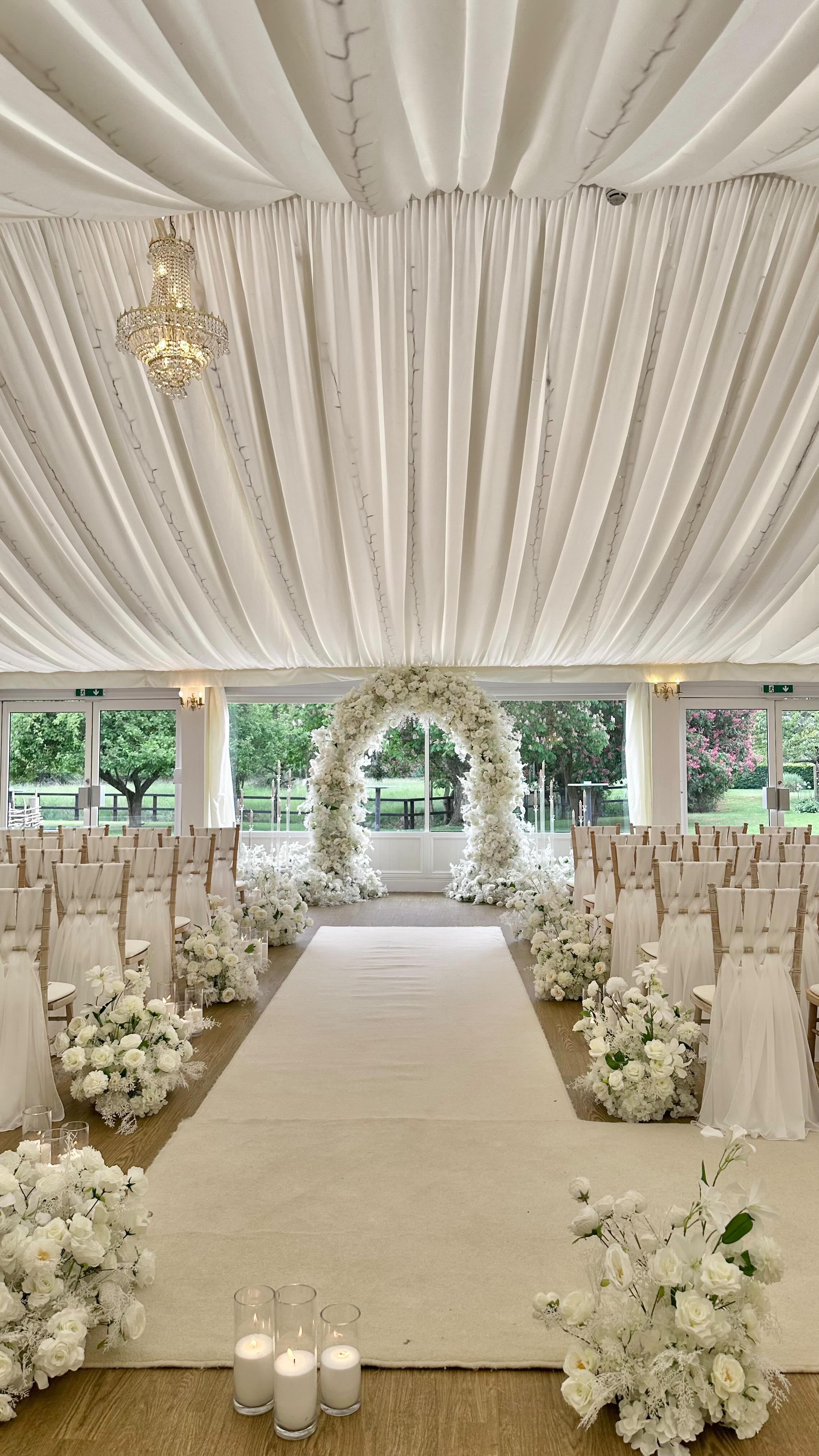 COYA & PAULO
The most beautiful ceremony at @fennesweddings for our lovely couple!
Soft neutral florals, our rainbow arch and flickering candles set the perfect scene for their ‘I do’ moment🤍
__
#weddingdecor #weddingarch #essexweddings #ceremonyflowers #weddinginspiration