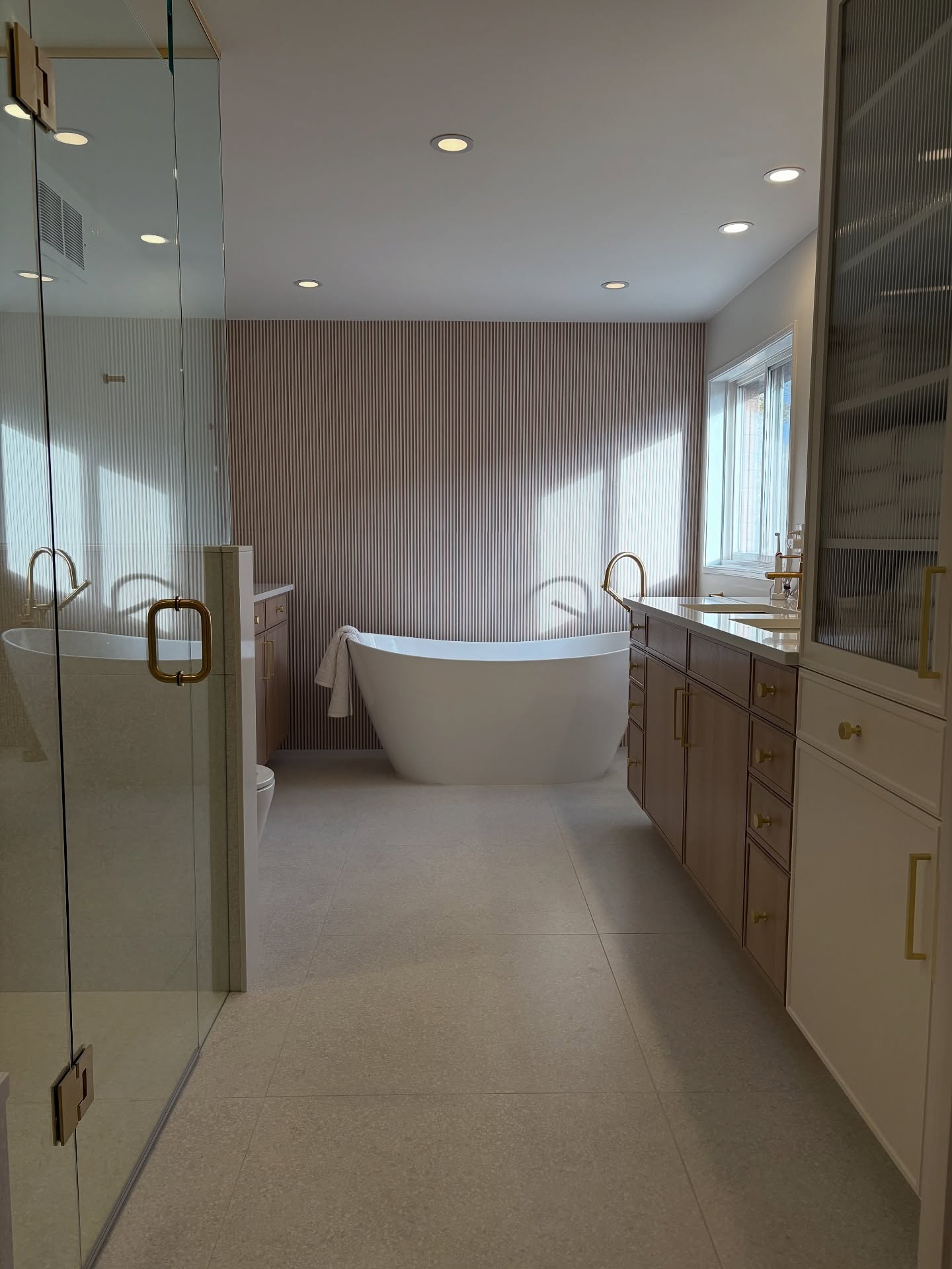 A Serene Primary Bath Retreat
This newly completed bathroom is all about calm, light, and modern luxury. Featuring soft-toned porcelain floors, Benjamin Moore paint - Swiss Coffee, warm white oak custom cabinetry, Hanstone Quartz Whistler Gold, a smart toilet, and a stunning ribbed accent wall, the space feels instantly spa-like. The sculptural stand-alone tub is the perfect focal point, framed by natural light pouring in from the window. Brass hardware adds just the right touch of elegance, while clean lines and minimalist details keep everything feeling fresh & serene.
A bright, airy sanctuary designed for slow mornings & peaceful evenings.
Contact us today for all your home renovation, interior design services & cabinet hardware needs.
@showerlagoon @cuisine.ideale @emco.oakville @vogtindustries @custometilestoneinc @blackcreektileinc @oakvillepaint @hanstoneca @stone_pro_countertops @gervaiselectric
#homereno #homerenovation #homerenovations #bathroominspiration #bathroomrenovation #bathroominspirations #interiordesigners #interiordesigns #primarybathroom #ensuitebathroom