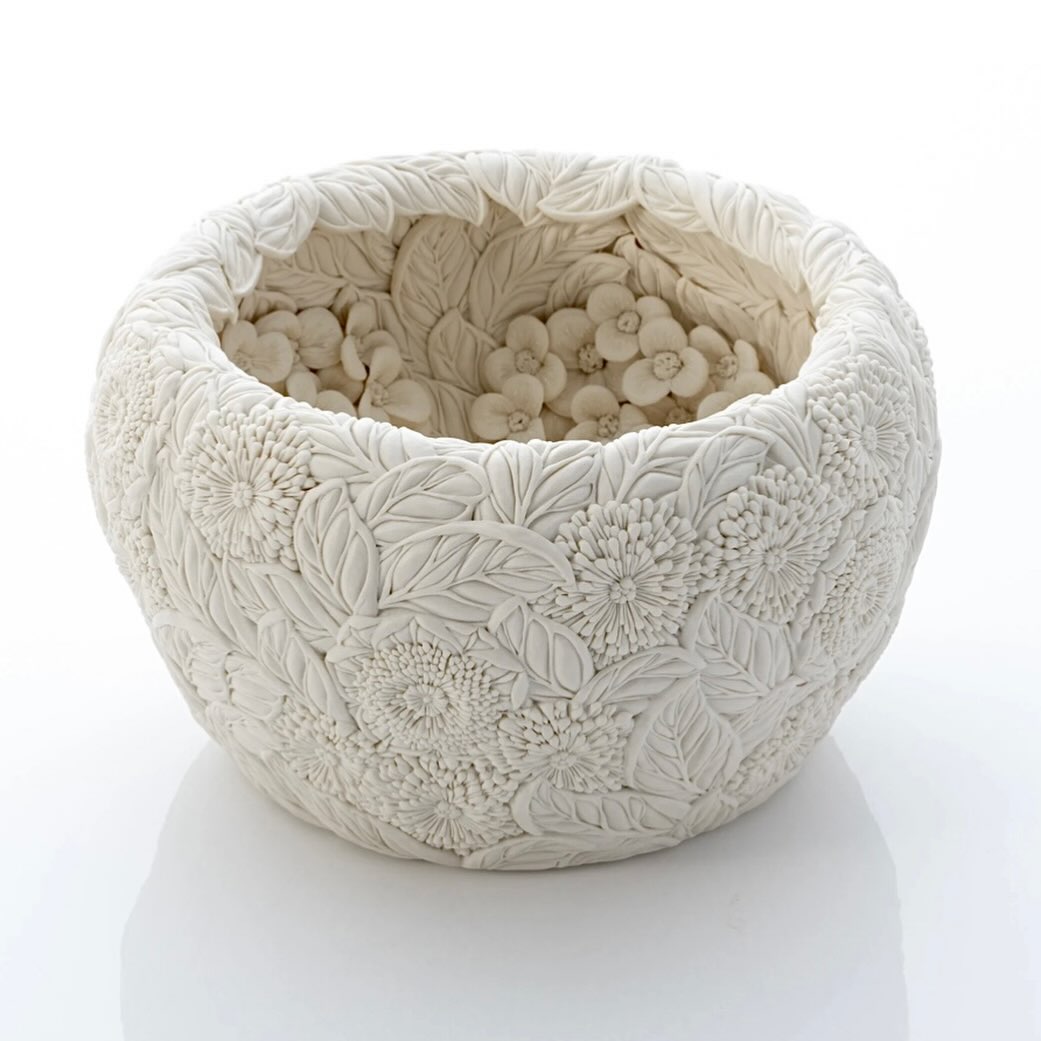 @designmiami has started today. My latest work will be exhibited with @adrian_sassoon_gallery at Booth G23.
Many thanks to the entire team.
PREVIEW DAYS (by invitation only)
Tuesday 2 Dec: 11am-6pm
Wednesday 3 Dec: 11am-1pm
PUBLIC SHOW DAYS
Wednesday 3 Dec: 1pm-7pm
Thursday 4 Dec: 11am-7pm
Friday 5 Dec: 11am-7pm
Saturday 6 Dec: 11am-7pm
Sunday 7 Dec: 11am-6pm
ADDRESS
Booth G23
Convention Center Drive & 19th Street
Miami Beach, USA
The show is WEST of the Convention Center on Convention Center Drive between 18th & 19th streets.
On this post :
A CAMELLIA, UME FLOWER, CHRYSANTHEMUM AND LEAVES BOWL, 2025
Moulded, carved and hand-built porcelain with an interior of dancing sprigs
H.12.5 Dia.21.5 cm
H.4 7/8 Dia.8 1/2 in
Photography by @sylvaindeleuphotographer
#porcelain #ceramics #craft #handmade #handcarved #clay #natureinspired #magnolia #sakura #cherryblossoms #petals #hands #creatingbyhands #hitomihosono#hitomihosonoceramics
#adriansassoon#adriansassoongallery
#designmiami2025 #designmiami #miamibeach #florida