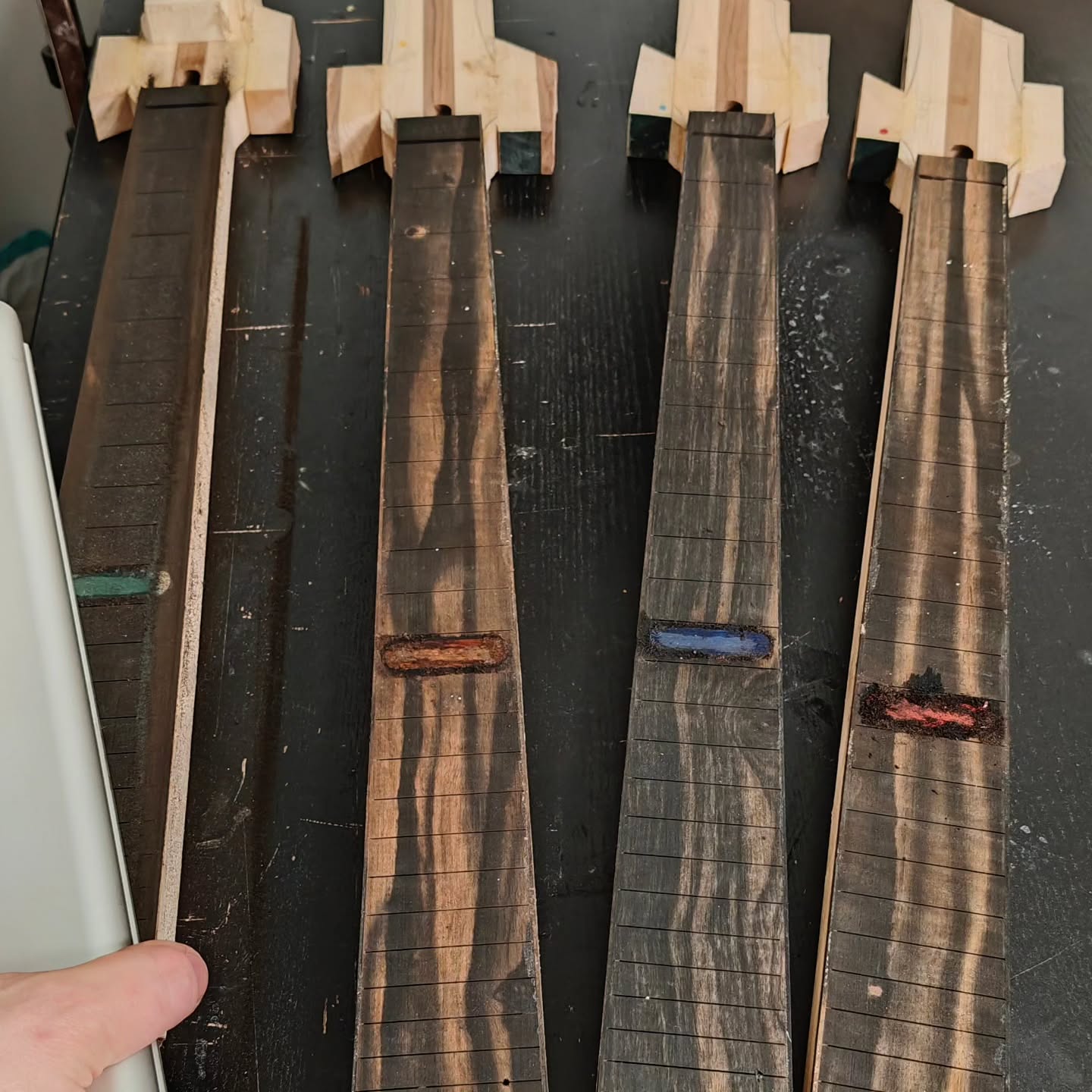 The Daedalus batch is progressing nicely.
You decided the colors on these four and throughout the build I've been careful not to mix up the woods between them.
Each has a birch top and the backplate, 12th fret inlay, and headstock detailing will be from the same piece and finished in the same color as well.
Been a looong time since I last did stained wood inlays and these got some special treatment, let's see how they turn out🤞🏻
Also, as February is mere months away, I changed the spec at the last minute, opting for Gotoh hardware over Hipshot as originally spec'd. Getting Hipshot over here is difficult and I want to start stocking an option that is readily available.
These 4 are gonna look great. Can't wait to see how they turn out.
#ipguitars @g_gotoh510 #luthier #guitarbuilding #customguitar