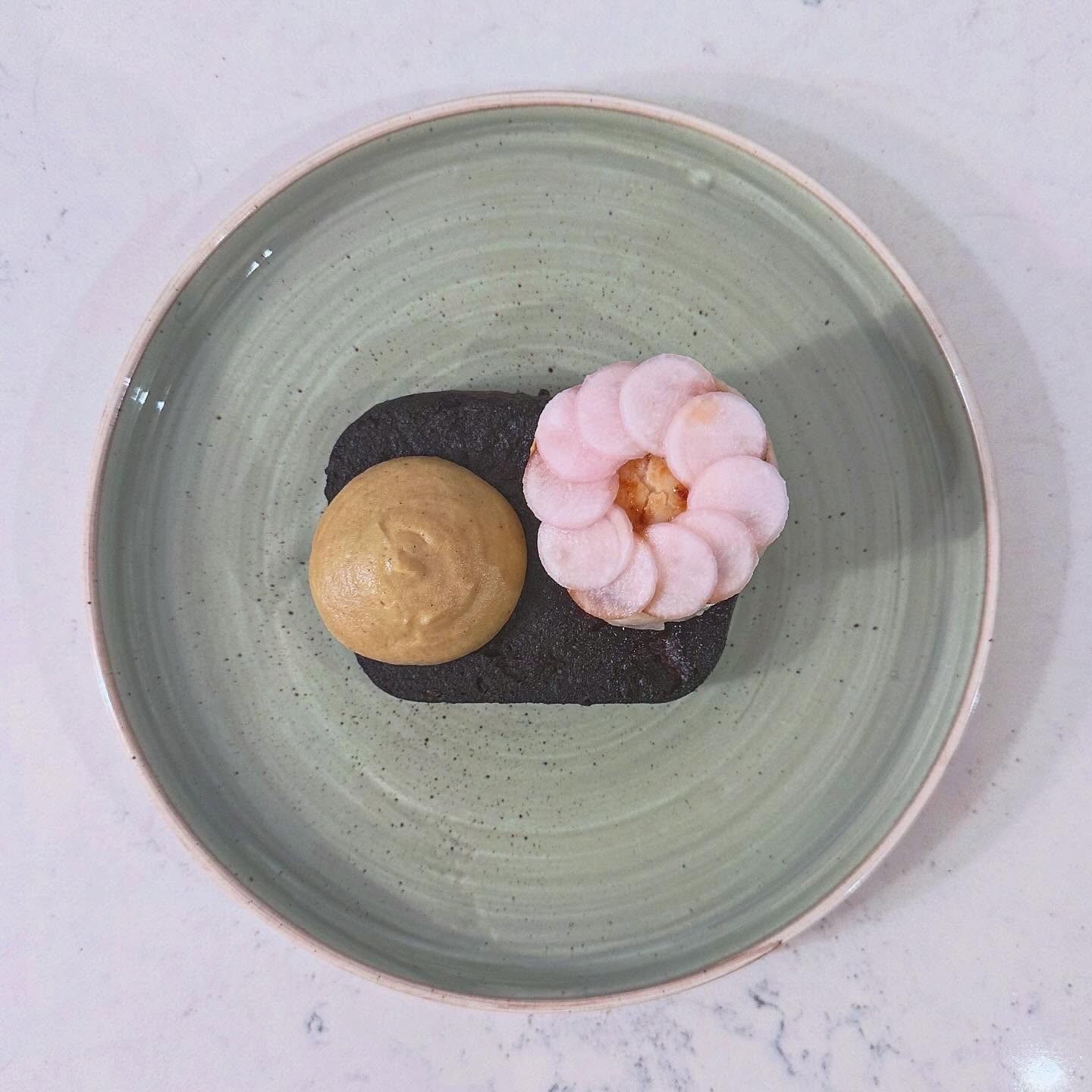 Homemade black pudding with roasted Orkney scallop, pickled turnip, roasted apple & red wine jus.
Late October we received a Mangalitza pig from @penlanheritagebreeds, and we made full use of the whole animal. Here, the blood and belly come together—using our own homemade pancetta for its fat and to add a little more texture to create our black pudding.
Mangalitza pigs are a rare, woolly lard breed, originally developed in the Austro-Hungarian Empire for the richly flavoured meat prized by the Habsburgs. Penlan’s hilltop farm in Carmarthenshire is home to the purest Mangalitza herd in the UK.
We honour that heritage by using the animal with care and purpose—and this black pudding is one expression of that.