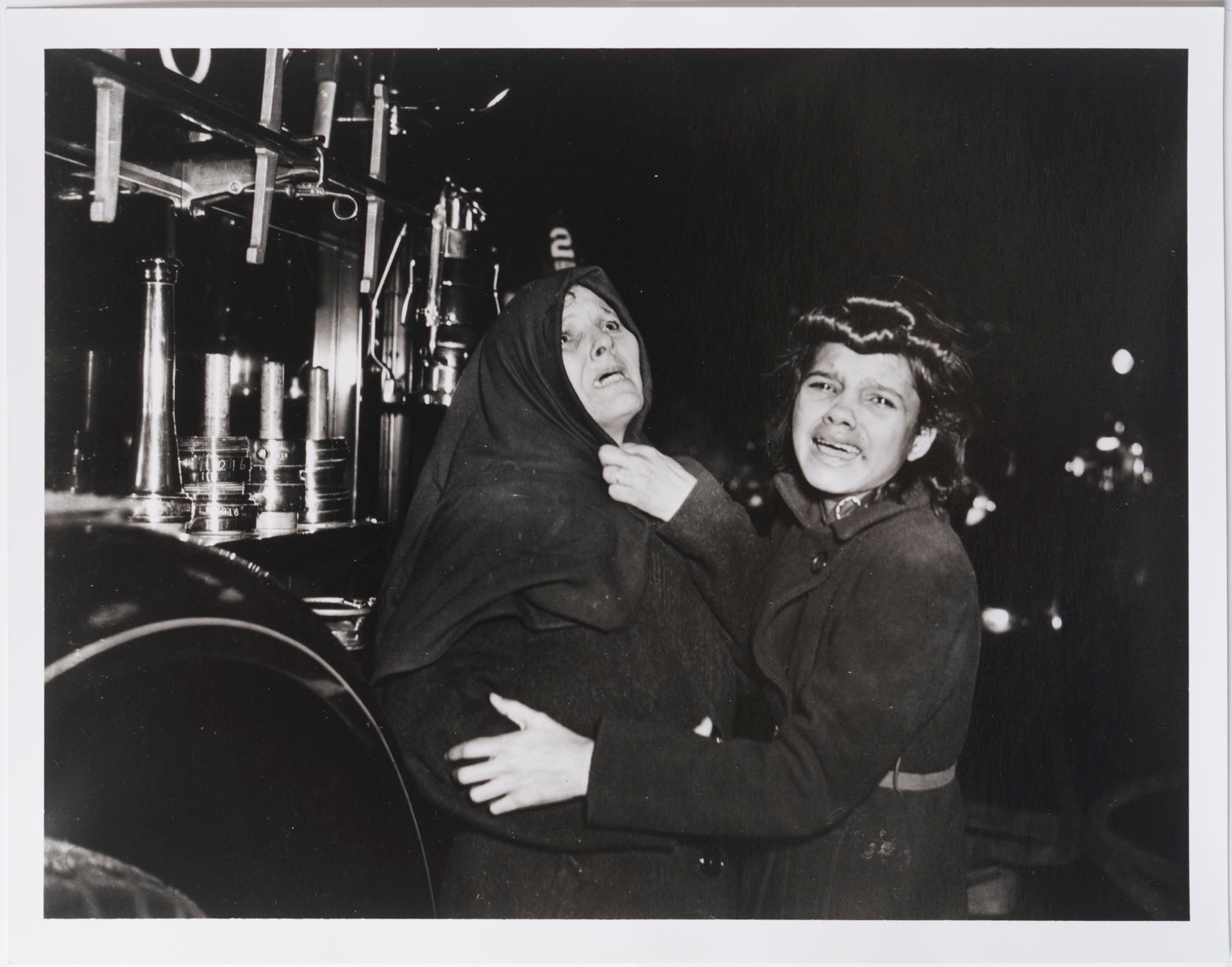 Weegee is on display as part of the #summersalon
1-5pm Thu-Sun until the 14 Dec 2025
#weegee If you have an image in your head of what a 1930/40s press photographer looked like and how they acted, it is most likely that you are imagining #ArthurFellig aka Weegee. He spent a lot of energy #selfpromoting. He stamped his prints with ‘credit photo by Weegee the famous’. It took some time before he was actually #famous.
He made his reputation photographing #humandrama, #carcrashes, #murders, fires and other mishaps. In the late #1930s, he started to photograph the effects on the living. in this downtime he photographed at bars, in theatres and anywhere else he could get a human interest story to sell to the press. The image above is considered one of the key images moving from the obvious to the profound. We love Weegee most for this period, for its #immediacy, and being part of a culture that has echoes but not the #oddness.
Later he moved to LA and pushed the making and printing with distorted portraits and scenes. This work has been shunned most of history, but is now being reconsidered.
The two are exhibition prints based on the 1982 prints by Sid Kaplan,
and were printed 1992 for an exhibition at Amber Film & Photography Collective, Newcastle upon Tyne. Providing that timeline is correct
In 1982, there was a portfolio of 45 prints made and has reappeared on major action sites. I can not find any information as to this set or date. I have contacted Side Gallery but no response. Are these much later digital prints based on the original portfolio? Or are they a later set of Silver Gels? If the 1992 date is correct they are #darkroomprints. I will continue to research. #streetphotography #pressphotography #weegeethefamous #nyc #newyork #fire #burningbuilding #gettheshot