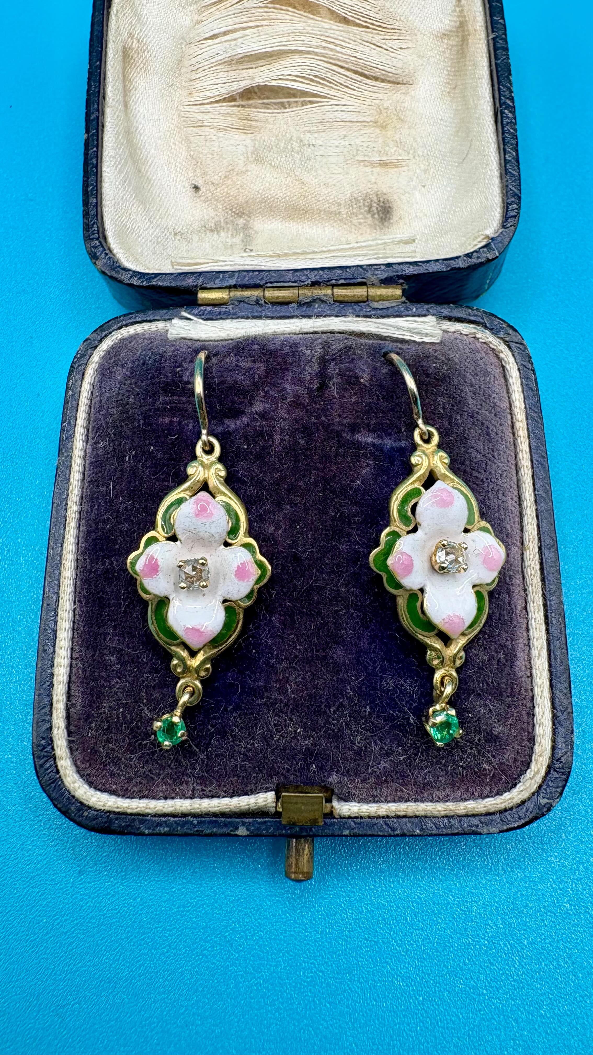 Such a pretty pair of Diamond, Emerald & Enamel Victorian Earrings, set in 18k Yellow Gold.
Available at www.heirloomjewells.com