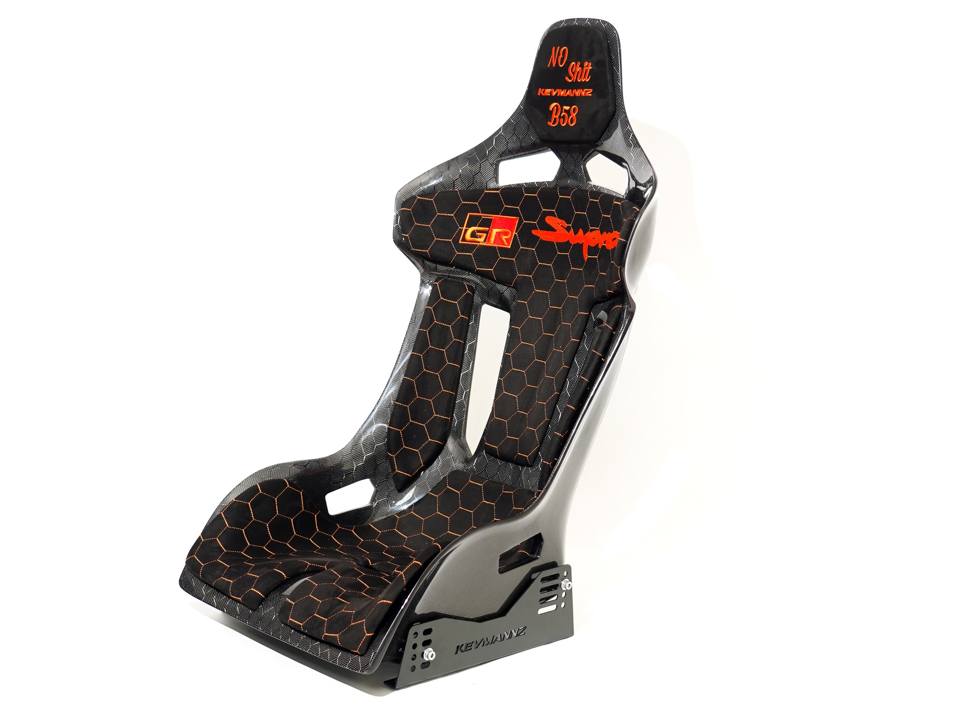Honeycomb CF Seat GT-Max + plug&play rails and slider kit for Supra A90 (MK5).
Customized alcantara padding with orange honeycomb stitching pattern and custom logo on headrest and backrest padding.
