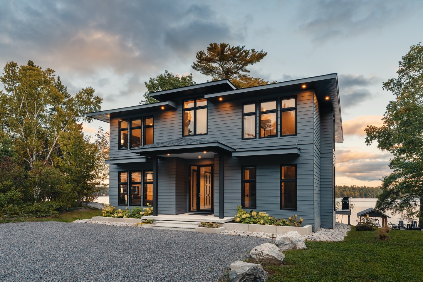 Step inside this stunning custom built home on Dudley Bay.
The main living space of this home is brought to life with a custom built backlit fireplace, meanwhile the kitchen is equipped with handleless cabinetry and a distinctive countertop. Down the stairs is an expansive secondary living space with a full golf simulator.
Follow @pattymacbuilt for more home & cottage inspiration!
Follow @spencerdouglasmuskoka for more design content and inspiration.
.
.
.
The team involved:
Built by @pattymacbuilt
Design by @spencerdouglasmuskoka
Cape Cod, Fir Timbers, Composite Decking, Interior Trim & Door Package, White Oak Stair & Railing Materials: @centurymilllumber
Roofing: @advancedroofsolutions
Electrical: @mcmorranelectric
Concrete Slabs & Custom Concrete Stairs: @armoredconcreteservices
Polished Concrete Flooring: @bedrockfloors
Gravel, Stones: @brentquarries
Millwork: @chervinkitchen
Foundation: @eruditeconstruction
Drywall: @inzaneinteriors
Blasting, Septic: @kenozhabaycompany