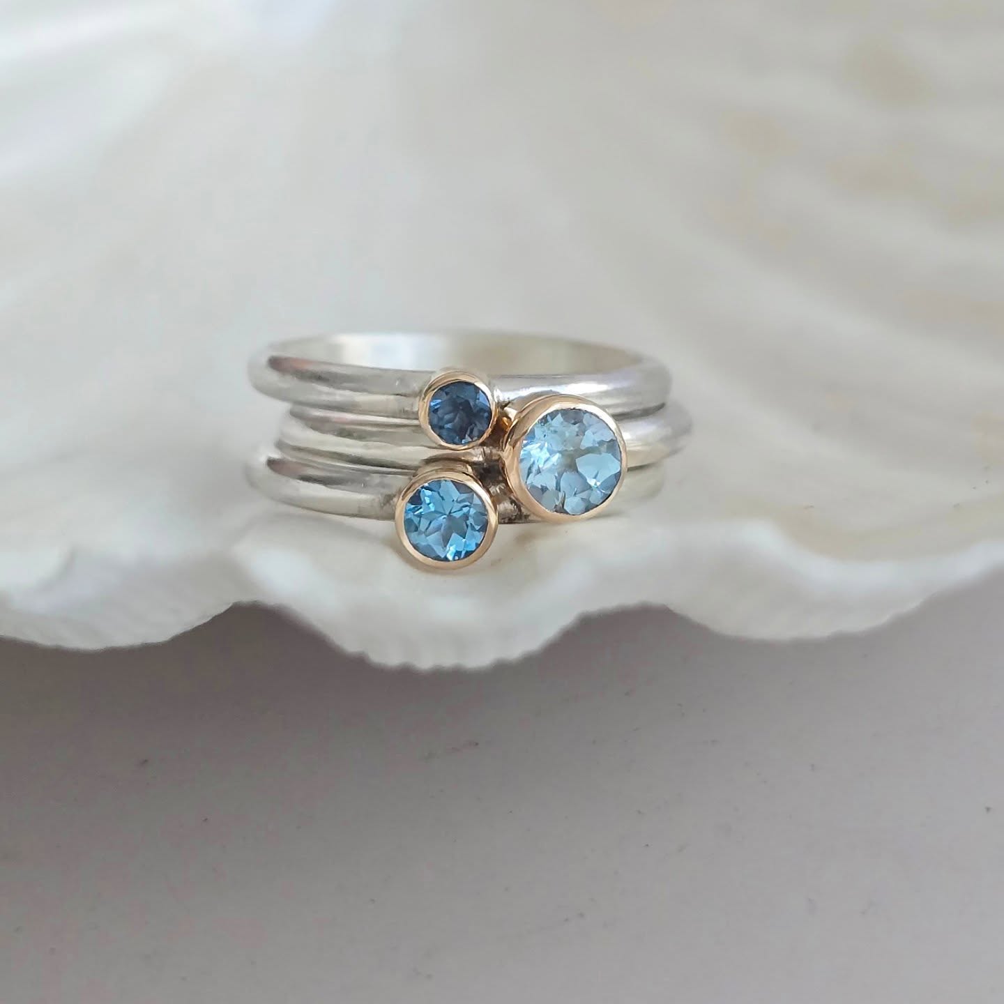 A trio of Topaz stacking rings. Love the 9ct gold setting on the silver ring band 💎