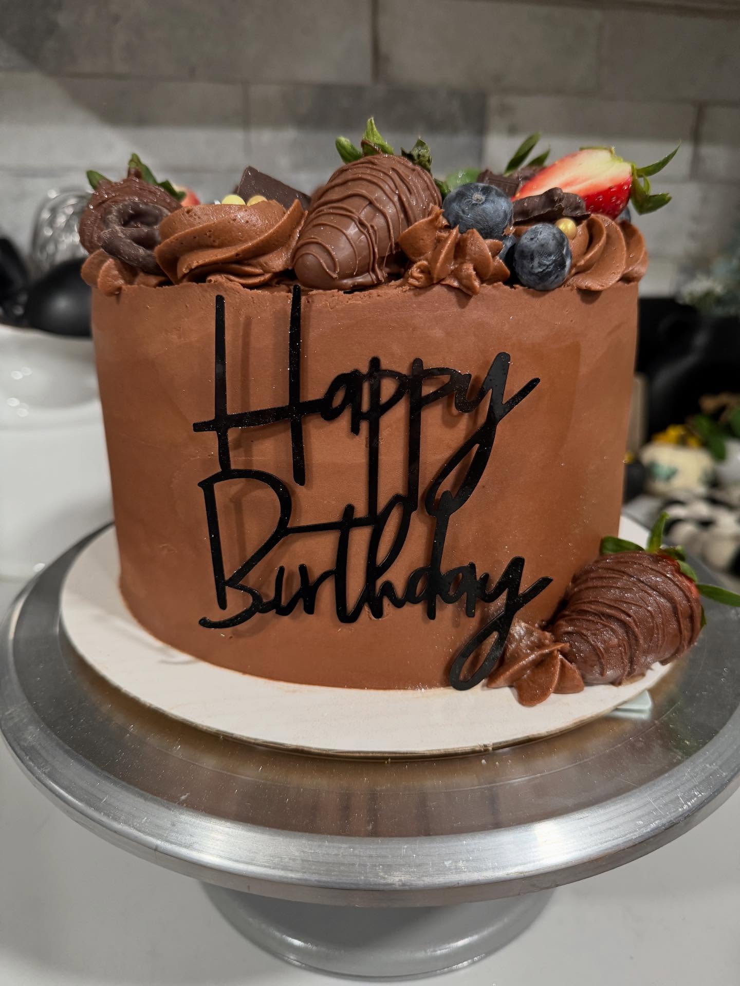 Delicious chocolate on chocolate birthday celebration cake