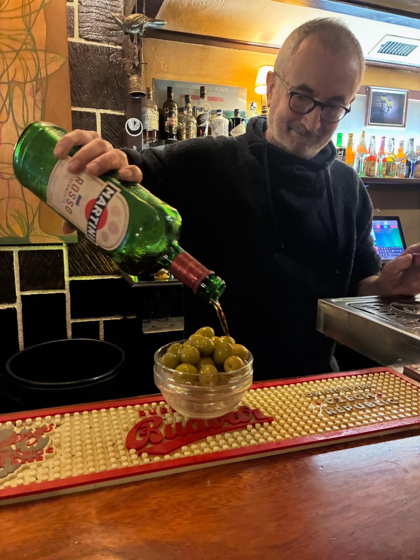 The neighborhood bar and the “special” olives.