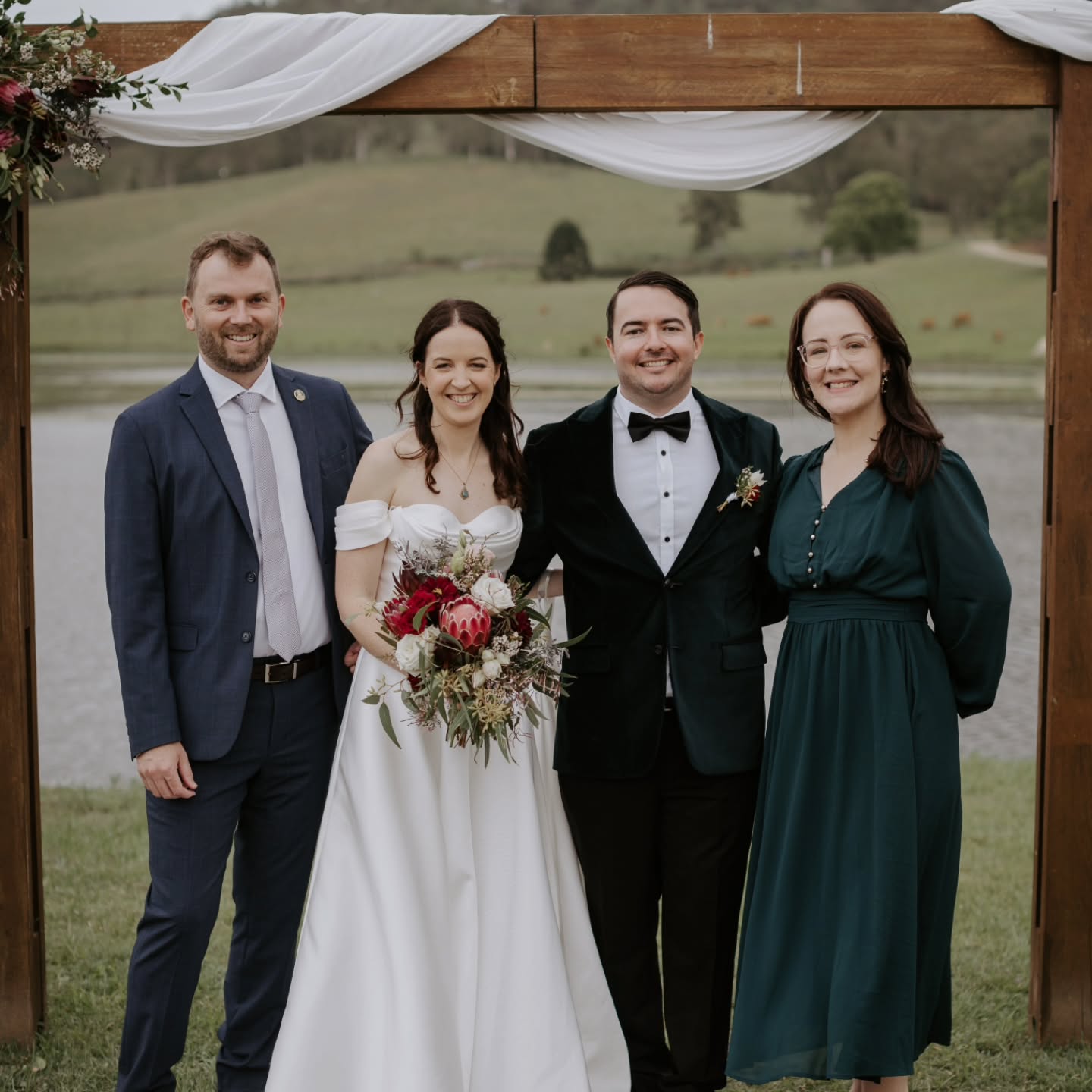 Katie and David said I do at Yabbaloumba Retreat in a gorgeous ceremony written and delivered by their good mate Ben. In the lead up, he and I worked closely together so he felt completely at ease. We chatted through his ideas, I offered a bit of writing support whenever he wanted it, and gave him some tips on presenting so he would feel confident. We even did a little rehearsal over coffee to make sure everything flowed just right.
When the moment came to make it official, Ben handed things over to me for the legal side of things.
Connection and building relationships is the heart of what I do, but even I couldn’t have told their story the way Ben did. He captured their world perfectly, because he’s been part of it.
Thank you to @bonniejenkins for the beautiful photos.