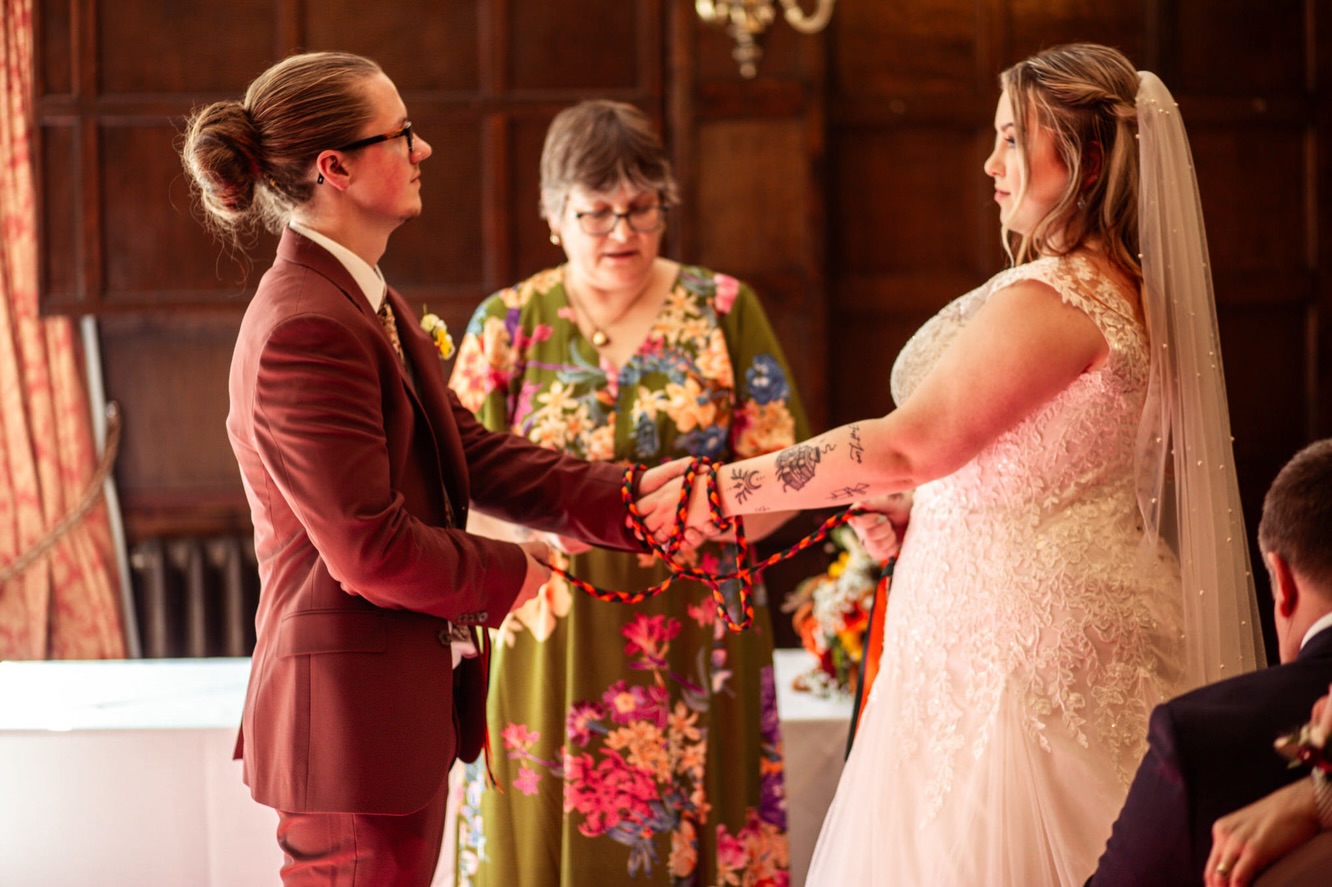 Day 6 of #adventweddingchallenge2025 is “rituals”. 🔗
After the legal part, Ella & James decided to follow it up with a handfasting ceremony; a symbolic ritual that involves binding a couple’s hands together with a cord to symbolize the joining of their lives. It’s a literal way to “tie the knot” — and a unique alternative to modern wedding ceremonies. With roots in Norse and Scottish culture, this ancient ceremony is believed to date back over 2,000 years (!!!).
•
Photographer: @cocos_camera
Venue: @maidsheadhotel_norwich
Wedding dress: @wed2b
Shoes: @drmartensofficial
Flowers: @theflowergallery__ Martham
#adventweddingchallenge #norfolkweddingphotographer #norwichweddingphotographer #suffolkweddingphotographer #eastangliaweddingphotographer #londonweddingphotographer
