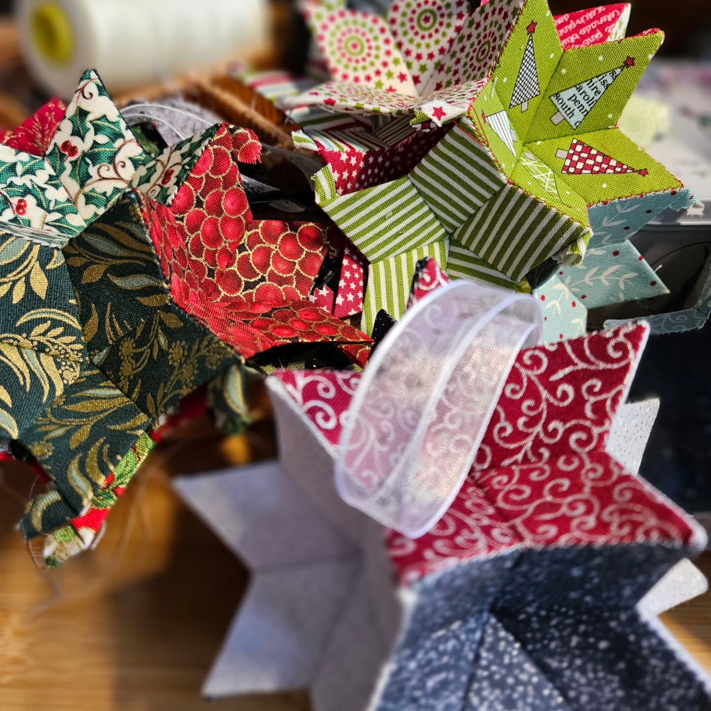 2 Chrstimas-themed Moravian stars finished, 4 more to go today. Very exciting. Come see them in person from 3 to 6 pm at Aegis Living Bellevue-Overlake on Wednesday, December 3 or reserve one for pickup elsewhere or shipping!
.
#moravianstar #englishpaperpiecing #eppornaments #handstitching #handquilting #handsewing #epp #handsewn #handsewnorrnaments #handmadeornaments #ornamentsasgifts #ornamentsallyear #ornaments #quiltedstar #sustainabledecor #horsenroundfiberstudio