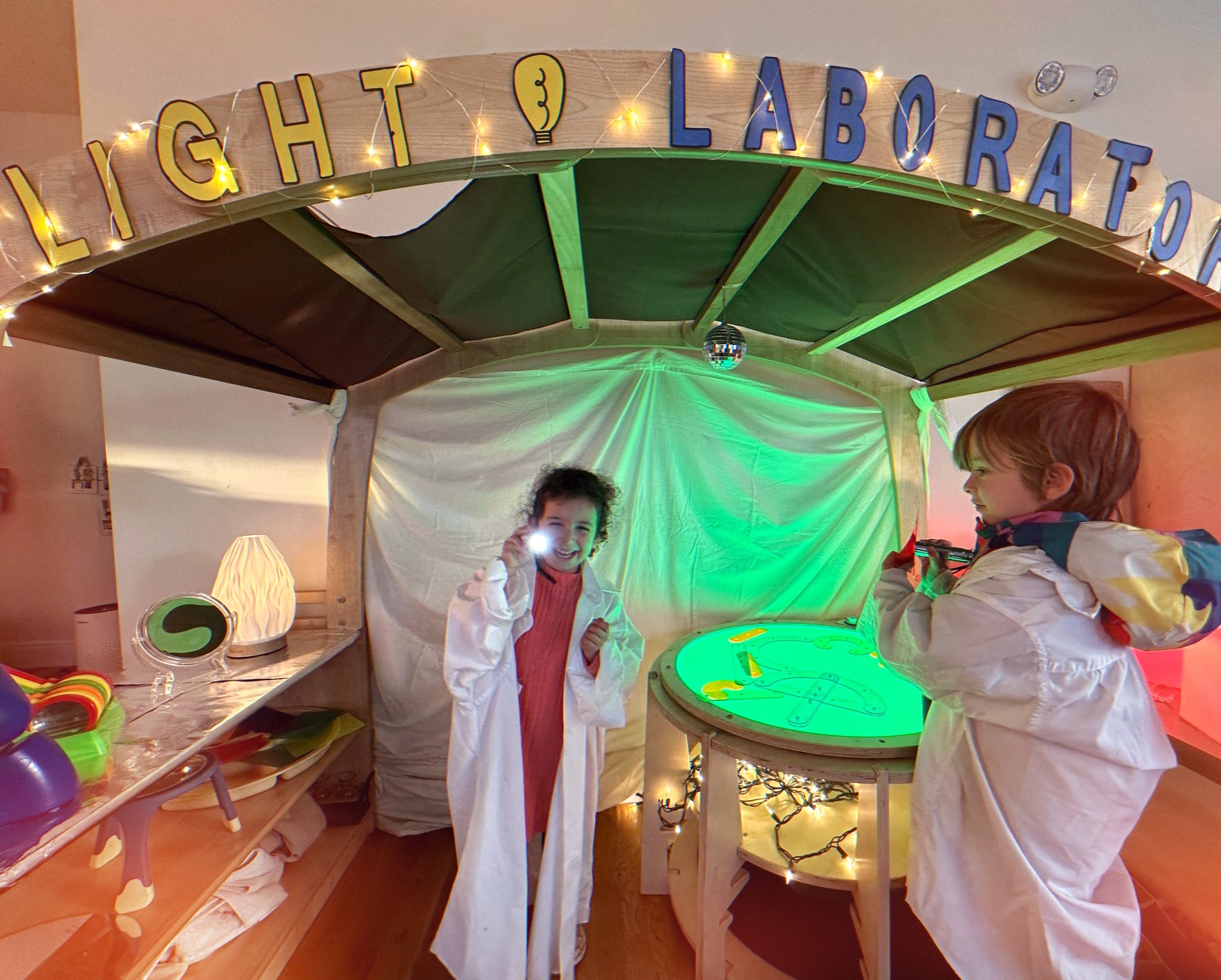 Our dramatic play area has been buzzing with excitement. We’ve transformed it into a Light Laboratory, complete with a light table, flashlights, colored plastic sheets, light blocks, tin foil, and prisms. Friends have been collaborating as scientists by observing how light moves, discovering how colors mix, and testing how different materials bend or reflect light. Their teamwork and curiosity have made this space especially lively and imaginative!