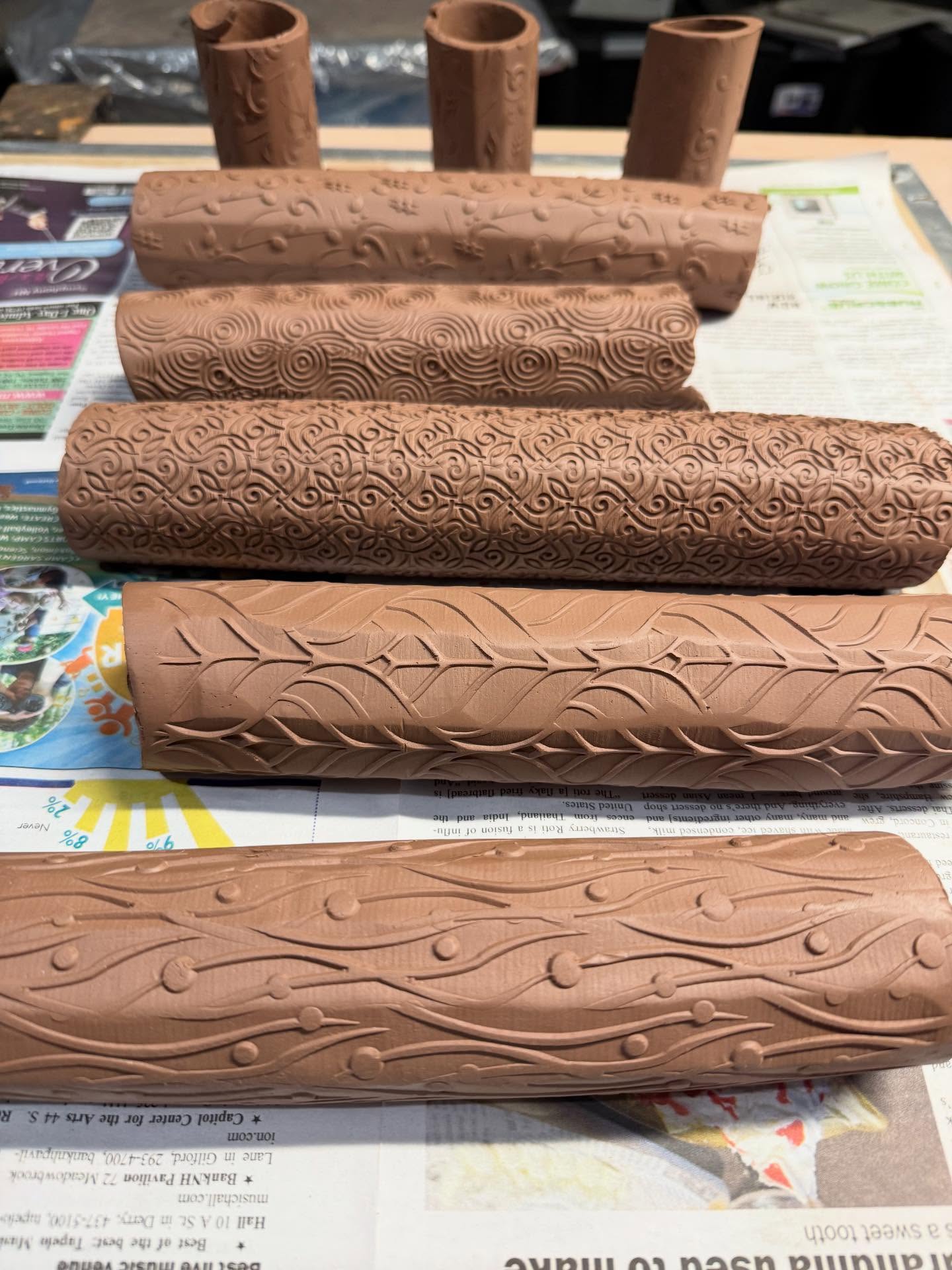 I’ve worked out a method to texture these extruded tubes. I kinda like the subtle faceted sides it creates, too! Vases and salt/pepper shakers coming up! #nhmade #handbuiltceramics l