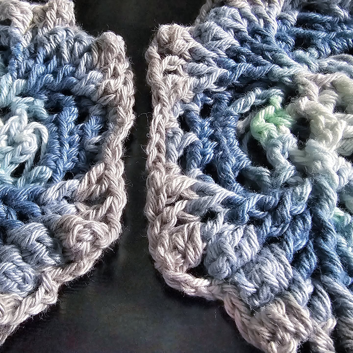 The Elemyst Bag is done! Well... done being crocheted 🤣 I am going to sew a lining in and weave in the ends today and tomorrow.
Pattern: Elemyst Pouch by @draiguna
Hook: 3.5mm
Yarn: Hobbii 8/4 cotton in 5 colors (Pale seafoam green; print in shades of mint, grey, and blue; midtone grey; blue-grey; dark blue-grey)
Pre-blocked measurements: 15" tall x 9.5" wide x 1" deep