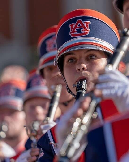 Meet Maddy Bridges ‘22! Maddy is our VP of Marketing with a degree in Information Systems Management. 😎
🐅Where are you originally from, and what brought you to the Nashville area?
Middle TN born and raised, I’m from right here! Born at Baptist Hospital then went from Nashville to LaVergne to Murfreesboro, which I consider my hometown! When I had the opportunity to move back towards home for work after graduation, it was a no-brainer.
🐅What made you want to get more involved with club leadership?
Knowing that I was moving back to a place that I was relatively familiar with, I knew that I wanted to get involved with the club as soon as possible to stay connected with Auburn. Leadership applications came out Spring 2022 and I applied before I had even graduated. I’m now on the executive committee after just over 3 years of serving with the club and I couldn’t be happier to be involved!
🐅Favorite place to eat in Nashville?
I love I Dream of Weenie in East Nashville, AND it’s Auburn owned!! You might be thinking “Mac n cheese? On a hotdog?” but I promise you it’s delicious. Honorable Mention: the WBLT weenie during Tomato Fest.
🐅What’s your favorite AU memory?
I usually say the 2019 Iron Bowl, but another top contender is when College Gameday came to Neville Arena for the first time in Spring 2020. Me and my roommate made a sign (that ended up on TV!) and then a group of us from the clarinet section met at the Waffle House on Magnolia at like 4am for breakfast before heading to get in line. Winning the game against Kentucky while in the Jungle is an unmatched feeling, and I got to experience it with some of my best friends!
Learn more about our leadership team at auburnnashville.com/about