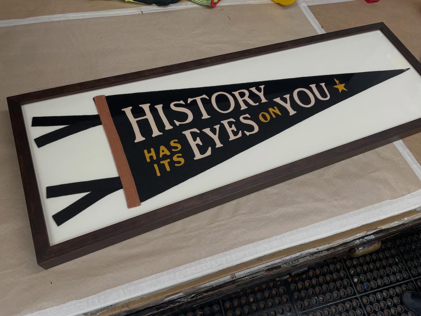 Another fun project leaving our bench. #hamilton #historyhasitseyesonyou #customartframing #banner