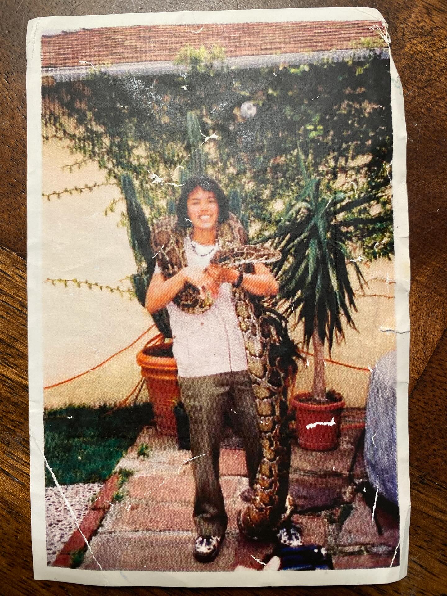 Throwback to my favorite job in college. Feels like a lifetime ago. I was a wild animal handler for after school programs and birthday parties. That’s me and a 100+ lbs Burmese python named Jasmine. She was the best. #sliceofheavenfarm #whatididbeforefarming