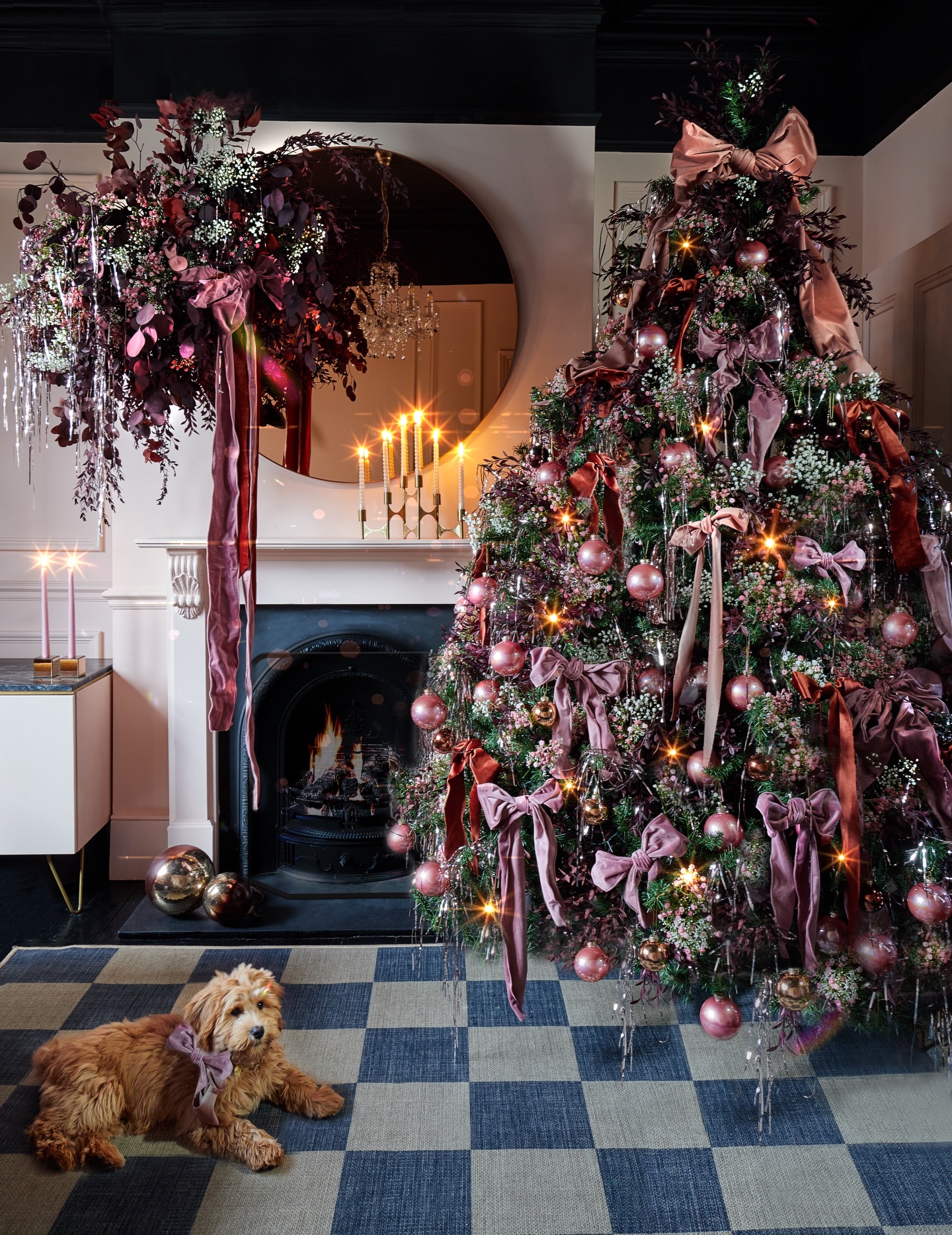 This tree has been a firm favourite over the last couple of years, but she actually made her debut back in 2022. My REMIX and REPURPOSE tree. Proof that you don’t need to buy new decorations every Christmas. I love dreaming up fresh ideas, but more often than not it’s the same pieces reinvented in new ways.
Every home made bow from Christmases past went onto the tree – the various pinks collected over the years, the velvet reds and rusts 🎀 – plus all the preserved burgundy eucalyptus and dried gypsophila from old mantel designs. Those shiny pink baubles that just keep on giving also made another appearance. I even reused the wire frame from my Halloween flower cloud. Nothing wasted, just reimagined.
It was such a creative challenge to make everything feel new again and, let’s be honest, far kinder on the purse strings. Even Dusty the dog got his first ever festive bow.
Are you team remix and repurpose, or team brand new every year?
—-
Christmas styling, creative Christmas tree ideas, bow Christmas tree, pink Christmas decor, sustainable Christmas decorating, repurposed decorations, festive home styling, remix Christmas tree, velvet bows, Christmas ideas, dried flower Christmas decor, UK interior styling, festive decorating inspiration.