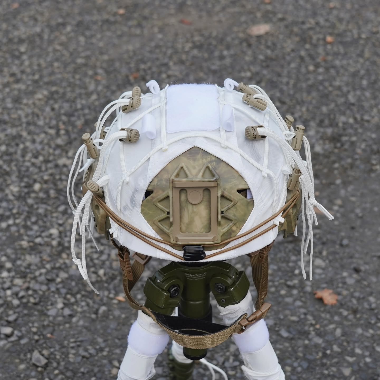 StalkLand VOID Recce Helmet Cover
Designed to offer the end-user a Ghillie quality concealment solution for their ballistic helmet while operating in an Arctic environment, the VOID Recce Helmet Cover features:
+ Compatibility with ECH, ACH, IHPS, and Ops-Core Fast high-cut ballistic helmet systems.
+ 70D DWR Coated Brookwood overwhite weight textile construction.
+ Para-cord Grid-lattice and qty. 12 Veg-Tie-Cords w/Cord Locks to attach and hold natural foliage in position.
+ Velcro top loop for attachment of IFF capabilities
+ Velcro rear loop section for attachment of Night vision battery packs
+ Allows access to night vision mounts and rail accessories
+ Stretch adjustable fit via Velcro One-Wrap mounting ensures cover remains in place during free fall or rotary-wing high-wind operations.
@tacticalconcealment @brookwoodcompanies @1_11_snipers