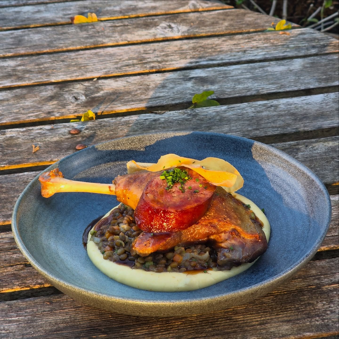 Confit Duck Leg with Morteau smoked sausage, braised lentils & parsnip purée