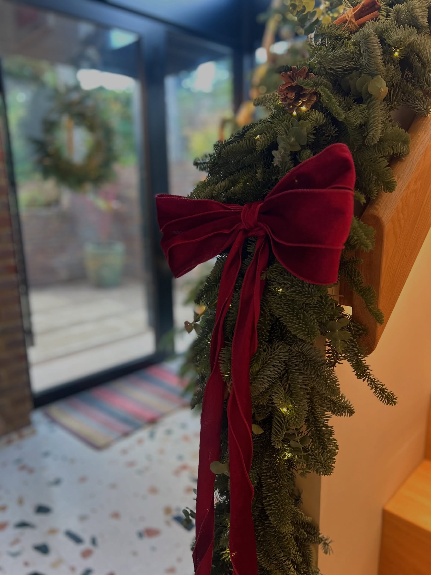 There’s something timeless about a staircase dressed for the season…
For The Pines home, I wanted the red velvet bows to take centre stage — bold, elegant and full of warmth, so the garland itself was intentionally restrained. We layered the Nordmann fir pine garland with fresh eucalyptus, natural pine cones and introduced subtle warm-white lighting to create depth without overwhelming the space.
The result is quiet luxury at its best…rich tones, natural texture, and a design that feels both festive and refined.
A huge thank you to Archer’s Low Nursery in Sandwich, who sourced the most beautiful garland. Their Nordmann fir was exceptional — full, sculptural and the perfect foundation for this look.
This staircase truly feels like a magical entryway moment, setting the tone for a Christmas that’s warm, welcoming and beautifully festive.
#christmasstyling #luxurychristmasdecor #staircasegarland #freshgarland #seasonaldecor #interiorstylinguk #nordmannfir #christmasinspo #understatedluxury #elevatedchristmas #redvelvetbow #festivedesign #holidaydecorideas #christmasentryway #homedetox #dealkent #kentstylist #christmasdesigner #interiorinspiration #christmasinteriors