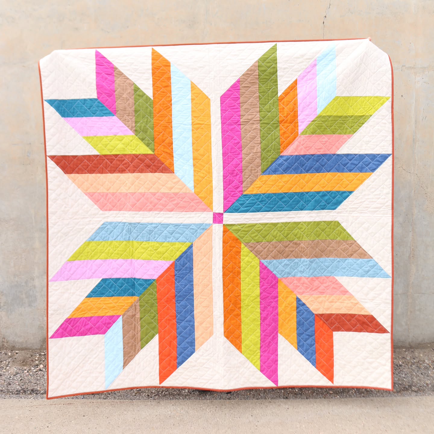 The inspiration for the Interchange Star Quilt pattern comes from slow-exposure photography of busy intersections at night. I love the long, bright lines created by the lights of cars driving in the many lanes and directions.
🚛🚚🏍️🚐🚙🛻🚗🚕🚌
If you want to get this pattern for 30% off, you should head to the website and use code STARPOWER at checkout!
Pattern: Interchange Star
Quilting: @dizzlepopshop