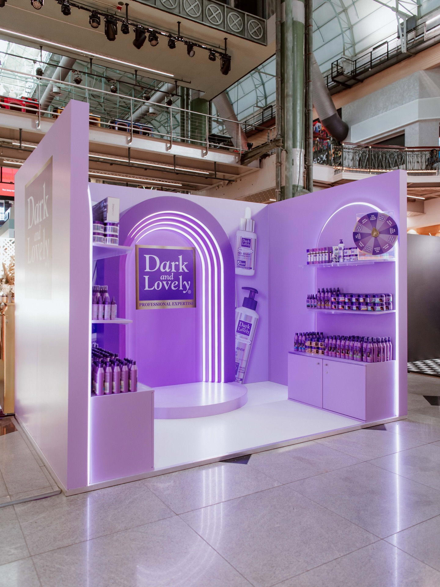 This @darkandlovelyafrica moment for the @dischem.beauty World of Beauty was built to glow - literally.
A rich, radiant purple palette sets the scene while sleek curves, crisp edges, and those iconic LED arches pull you straight into the spotlight 💜
Every detail was crafted to shine: perfectly merchandised shelves, luminous lighting, and a finish so smooth it feels custom-blended. From the hero alcove to the final polish, the entire build was designed to celebrate beauty in its boldest form.
At Happinest™ Custom, we don’t just create spaces - we create scenes worth stepping into. 💜✨
#darkandlovelyafrica #Dischemworldofbeauty #darkandlovelywob #brandbuilds #photoboothmagic #summerlaunch #happinestcustom #happinest #madeyoulook #custombuild #customdisplay #customstand #expoexcellence #expostand #awardwinning #expovibe #brandactivation #expoexcellence #visualmerchandising #capetowncustom #photomoment #brandelements #display #custombackground #customdisplay #memorablemarketing #impactfuldesign