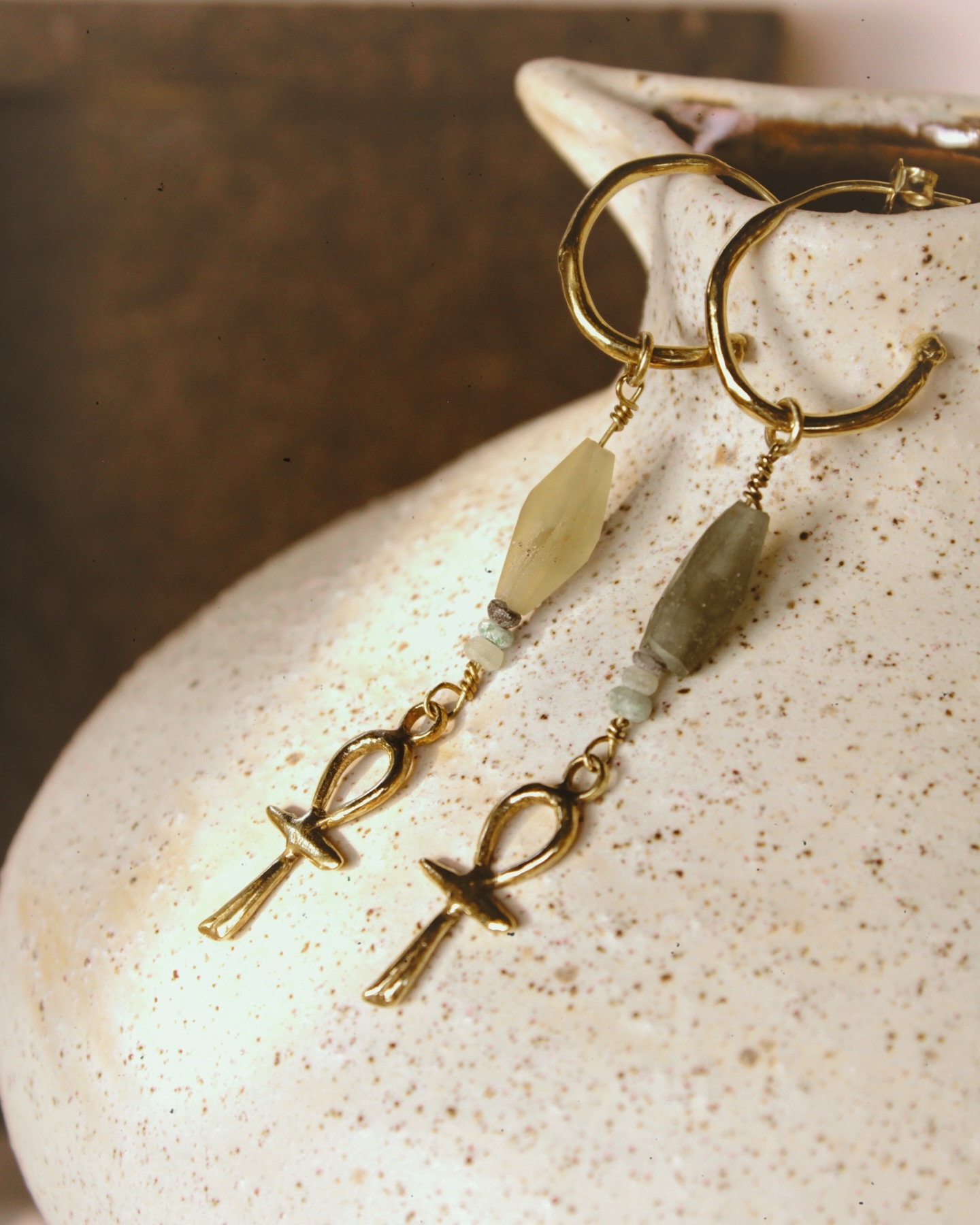 ANKH EARRINGS with Ancient Roman glass✨ another version of our Ankh hoop earrings, 2000 years old blue-green glass adorn these earrings❤️ available on etsy now 🌞
The Ankh symbol is used as a protective amulet that represents earthly life and the continuity that extends beyond death. It is also connected to the union of the masculine and the feminine: the upper loop represents the womb and the ability to give life, receptive, intuitive energy. The lower part symbolizes the masculine principle of expansion and projection, the active creative force.
These earrings are a powerful emblem of balance, rebirth, and timeless vitality, a reminder of harmony, protection, and life’s eternal flow.
✨Etsy shop link in bio 🌞
#ancestraljeweley #handcraftedwithsoul #ancientroman #ancientromanglass #ancient #consciousfashion #slowmadejewelry #ancientwisdom #ancientjewelry #joyeriatradicional #traditionaljewelry #joyeriaconalma #souljewelry #consciousjewelry #ethicalbrand #slowjewelry #middleeastern #middleeasternfashion #middleeast#middleeastjewelry #ankh #ankhjewelry #egyptianjewelry #ancientegypt #ancientegyptian #etsyshop#etsy#etsyjewelry #etsyjewelryshop
