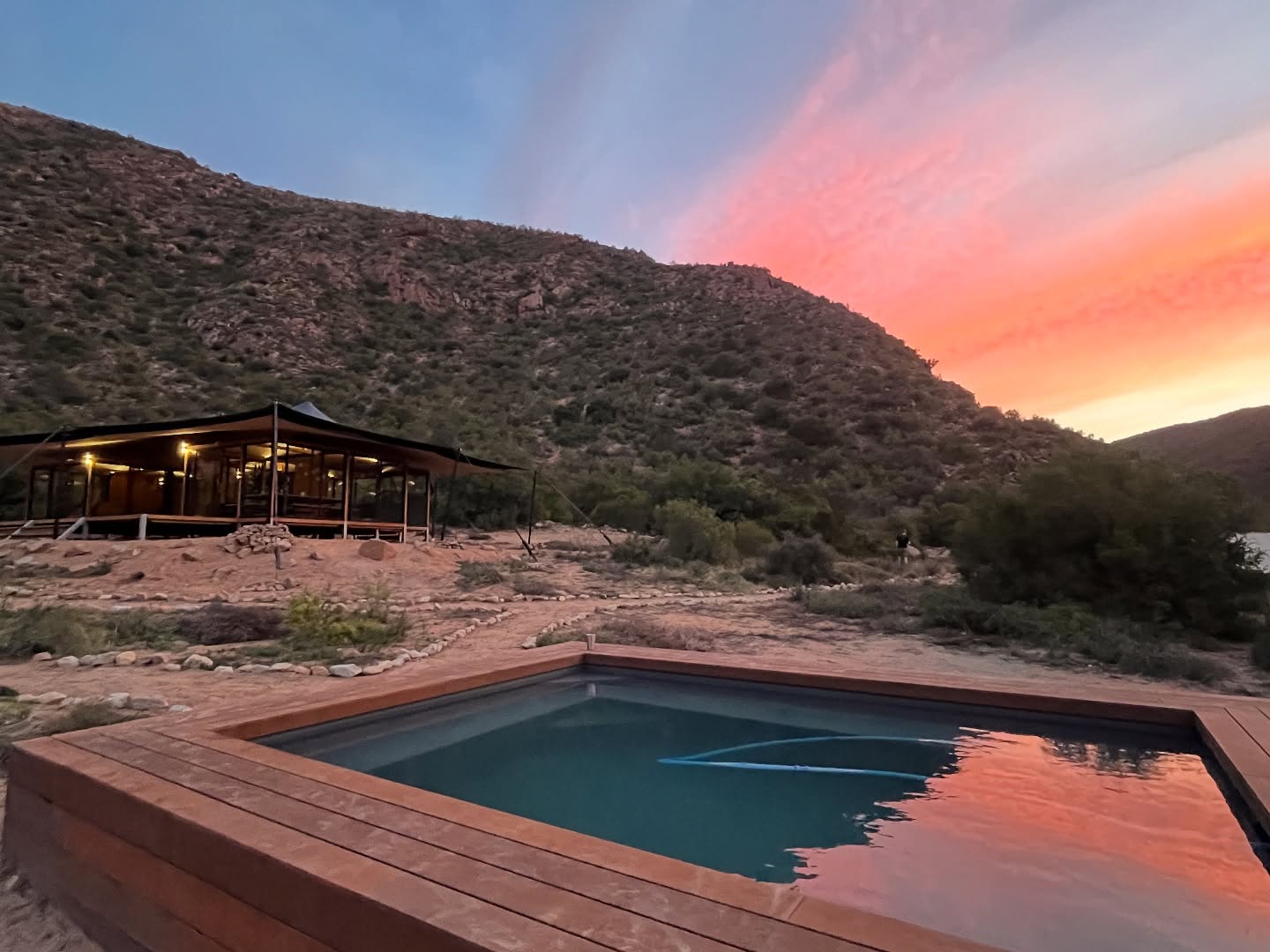 The Trail: Distances, Terrain & Wild Beauty - and pics from our day 2 on the trail and the most amazing sunset!
🥾⛰️💦
This new Baviaanskloof Canyon Trail route unfolds over 5 days, each one with its own rhythm and challenges:
Day 1 — 17 km:
A warm-up that’s not really a warm-up — long stretches, rocky paths, and your first views of the towering cliffs that define this valley.
Day 2 — 17 km:
The landscape tightens into gorges and narrow passages. Expect steady climbs and descents, with the mountains rising dramatically on both sides.
Day 3 — 10 km:
Prepare to be WOWed on this shorter, but full of character day. River crossings, shaded kloofs, and a cool off in natural rock pools — a slower, playful day.
Day 4 — 16 km:
A big one. High ridgelines, exposed sections, and wild, sweeping views that make the effort worth it.
Day 5 — 18 km:
A final stretch through shifting terrain — open valleys, rocky passes, and one last dose of Baviaanskloof beauty before the trail ends.
Rugged, varied, and incredibly rewarding — a full immersion into real wilderness.
#TrailStats #baviaanscanyon #baviaanscanyontrail #HikingAdventure