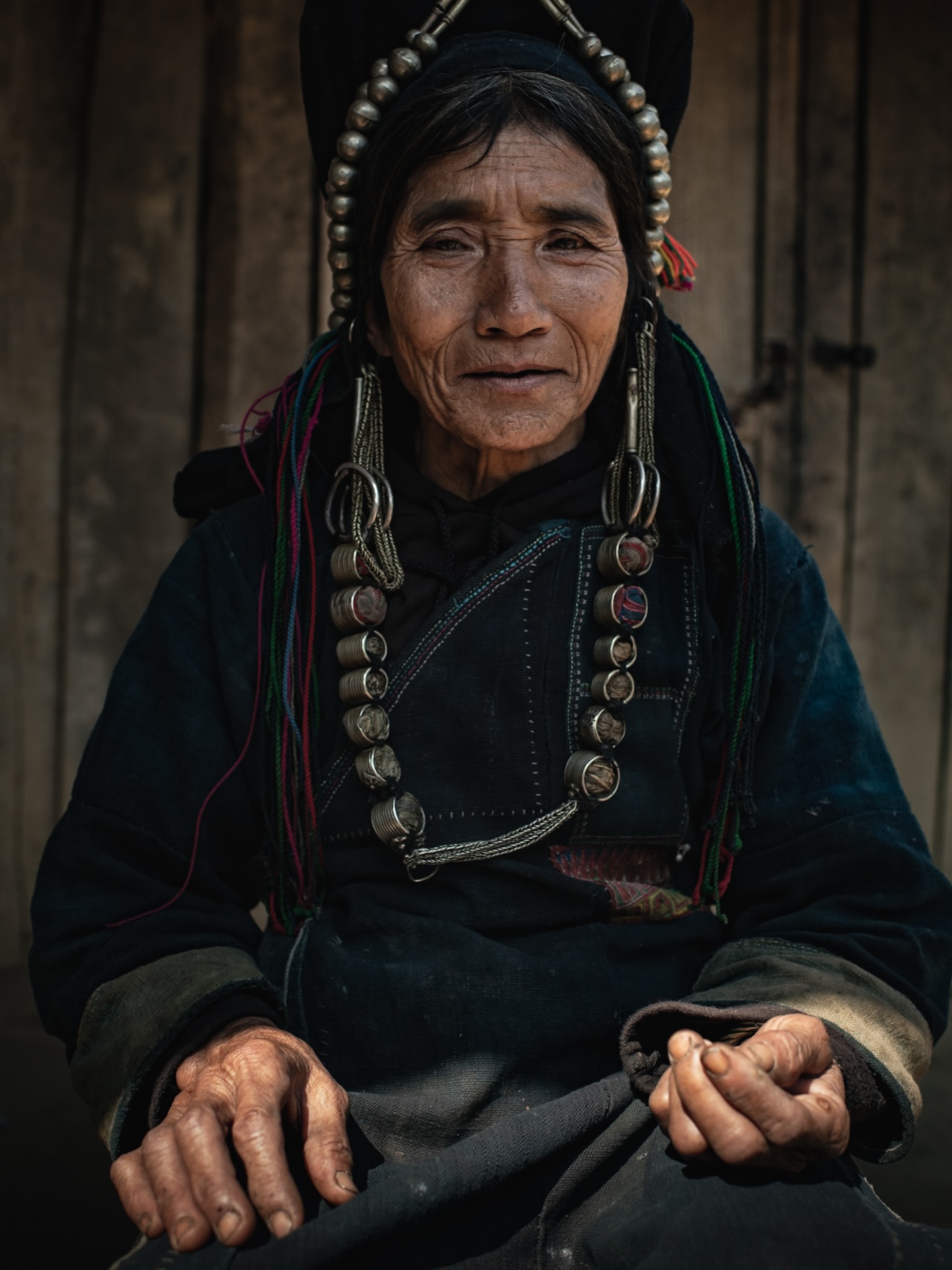 31 years ago, Shyn Guye carried her house down the mountain, plank by plank, walking for three days. The whole village moved their wooden homes to a safer valley.
She still sleeps in her heavy silver headdress, her only wealth besides a few pigs and a buffalo. The silver belonged to her mother,both her parents died when she was a child, and her older brother raised the family. He hunted small birds and squirrels, at one point they would rely on tree bark to survive.
Now, looking at her children and grandchildren, she says life has changed. When a child today feels like they want something, they just get some little money and buy themselves a sweet at the store.
#storiesthatinspire #womenphotographers #peoplesportraits