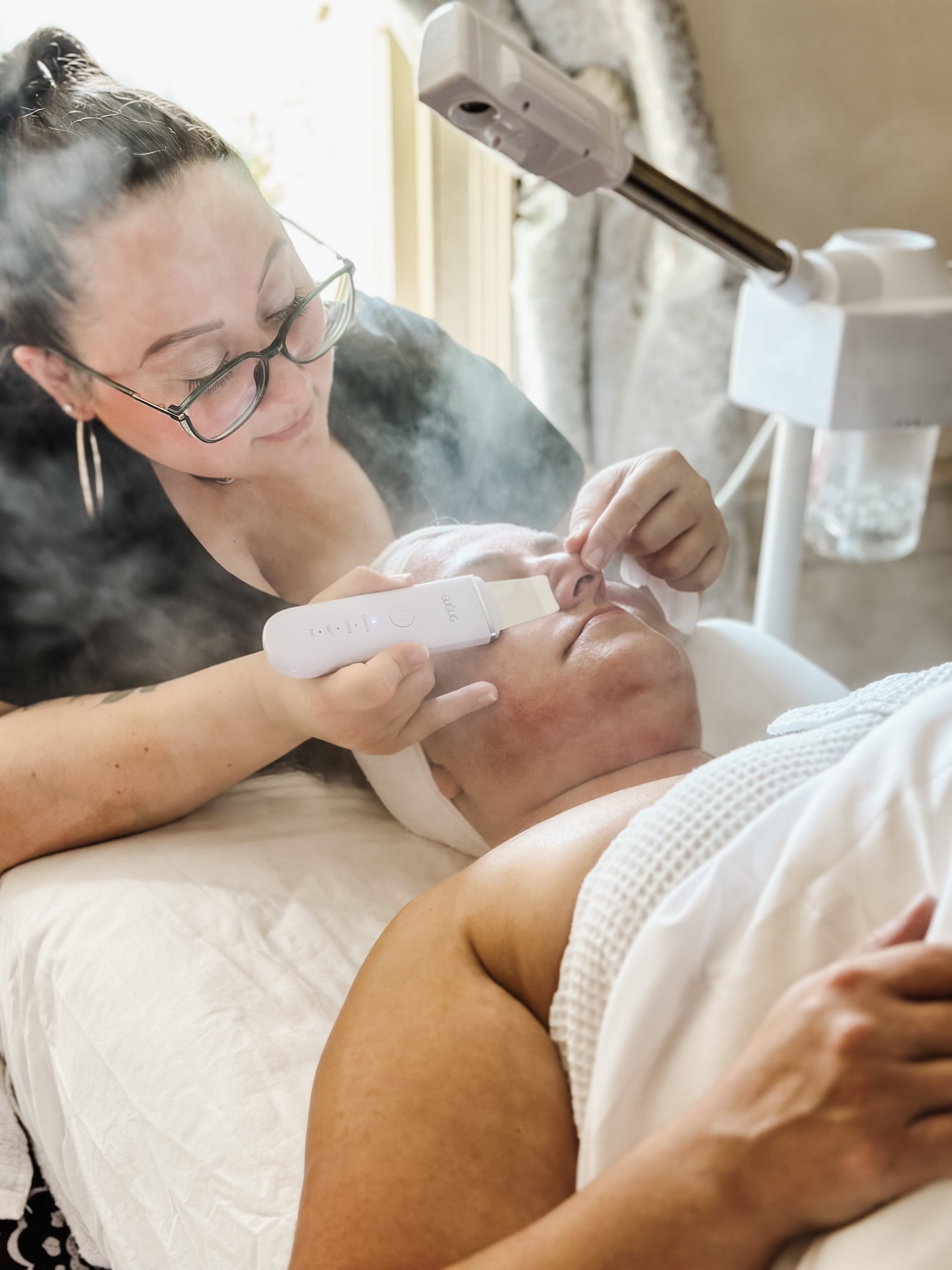 🌬️❄️ Defend your skin against the harsh winds of winter with a rejuvenating holistic facial offered by Ally, our in-house esthetician.
Ally brings a calming, nurturing presence to Tea & Tarot, crafting the perfect cup of tea and welcoming you into her treatment room. Her work blends intuitive care with gentle, grounded magic, helping every guest feel seen, supported, and soothed from the inside out.
🧖🏽♀️ Each holistic facial is designed to restore both skin and spirit. Treatments include a customized cleanse, exfoliant, mask, and massage using vegan, cruelty-free products chosen with intention. Longer sessions expand into scalp massage, and deeper facial work, while her 90-minute facial includes a crystal map and a two-card intuitive pull for the ultimate soul-nourishing glow.
What sets Ally’s practice apart is her methodology: she believes skincare is energetic as much as it is physical. Through crystal mapping, mindful touch, and compassionate presence, she creates a space where your nervous system can settle and your inner light can rise. Every session is created to help you leave feeling clearer, softer, grounded, and cared for.
Ready to unwind, glow, and reconnect with yourself? Book a facial with Ally and treat your skin, and your spirit, to the care they deserve. Now accepting appointments for January. ✨
#TeaAndTarot #Connecticut #HolisticFacial #SkinCare #CTEsthetician #ClintonCT #CTShoreline #HolisticHealing