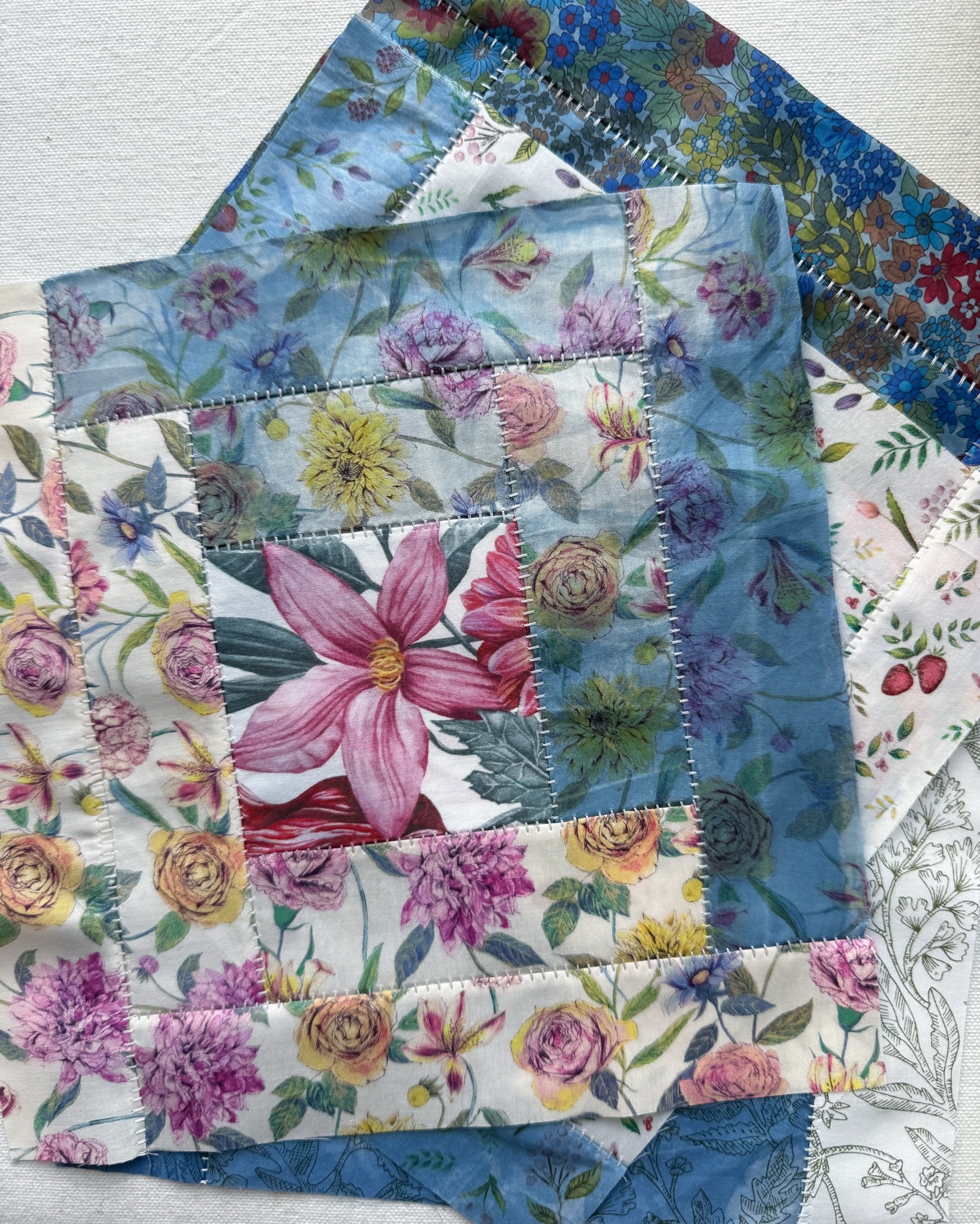 Someone asked about what stitch I used on these log cabin blocks so I thought I’d reshare the pics – I actually wrote a whole blog post for BERNINA on We All Sew about how much I love this stitch 😂 – it’s a flatlock stitch which I did on my BERNINA L890 overlock/coverstitch.
In the last photo you can see what the back of the flatlock looks like. It covers up the seam allowance which is why I can use this block for a shirt – no fraying seams on the inside!
Also I like to reshare these blocks because how cool is it that I made them out of a fabric and then that same fabric I hand-dyed in an indigo vat?? ☺️ Pretty darn cool.
#logcabinquilt #indigodyed