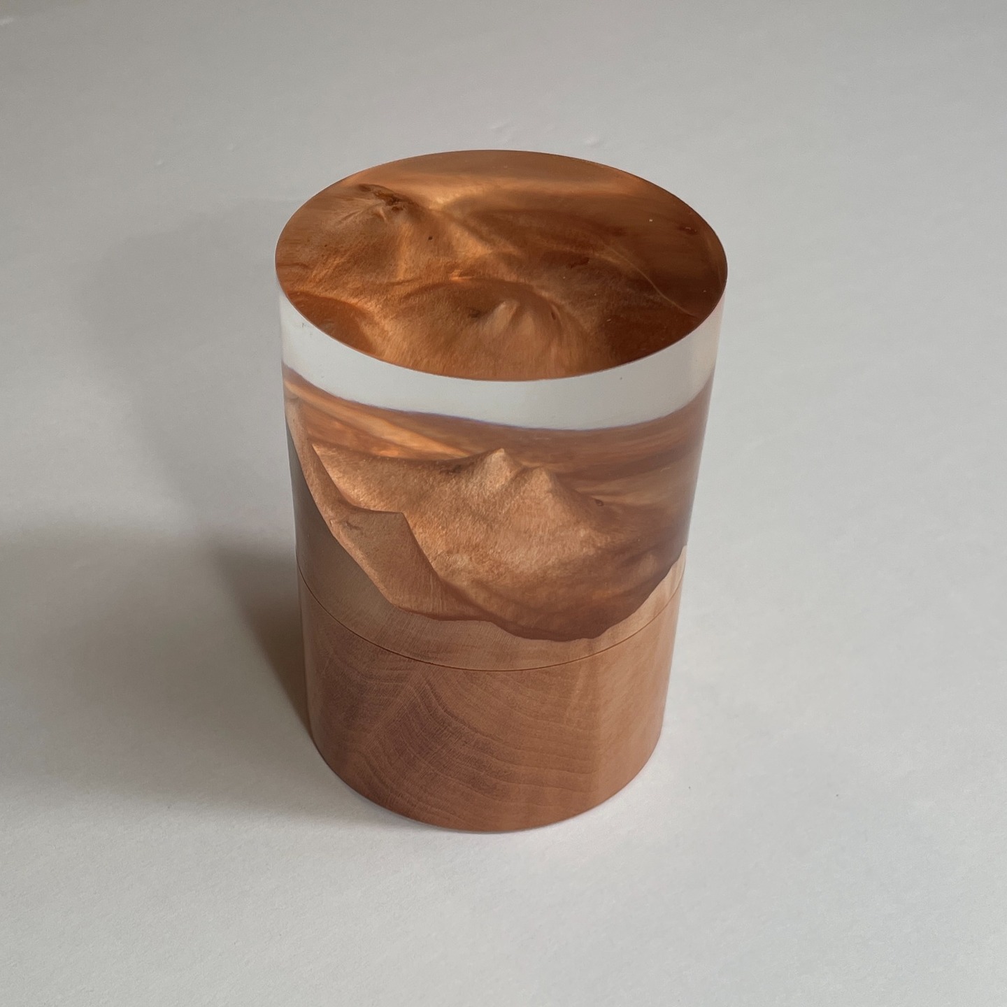 A small threaded keepsake box. Arbutus Burl with clear resin. Finished with tung oil. 3.5" X 2.5" diameter.
darawoodworks.com